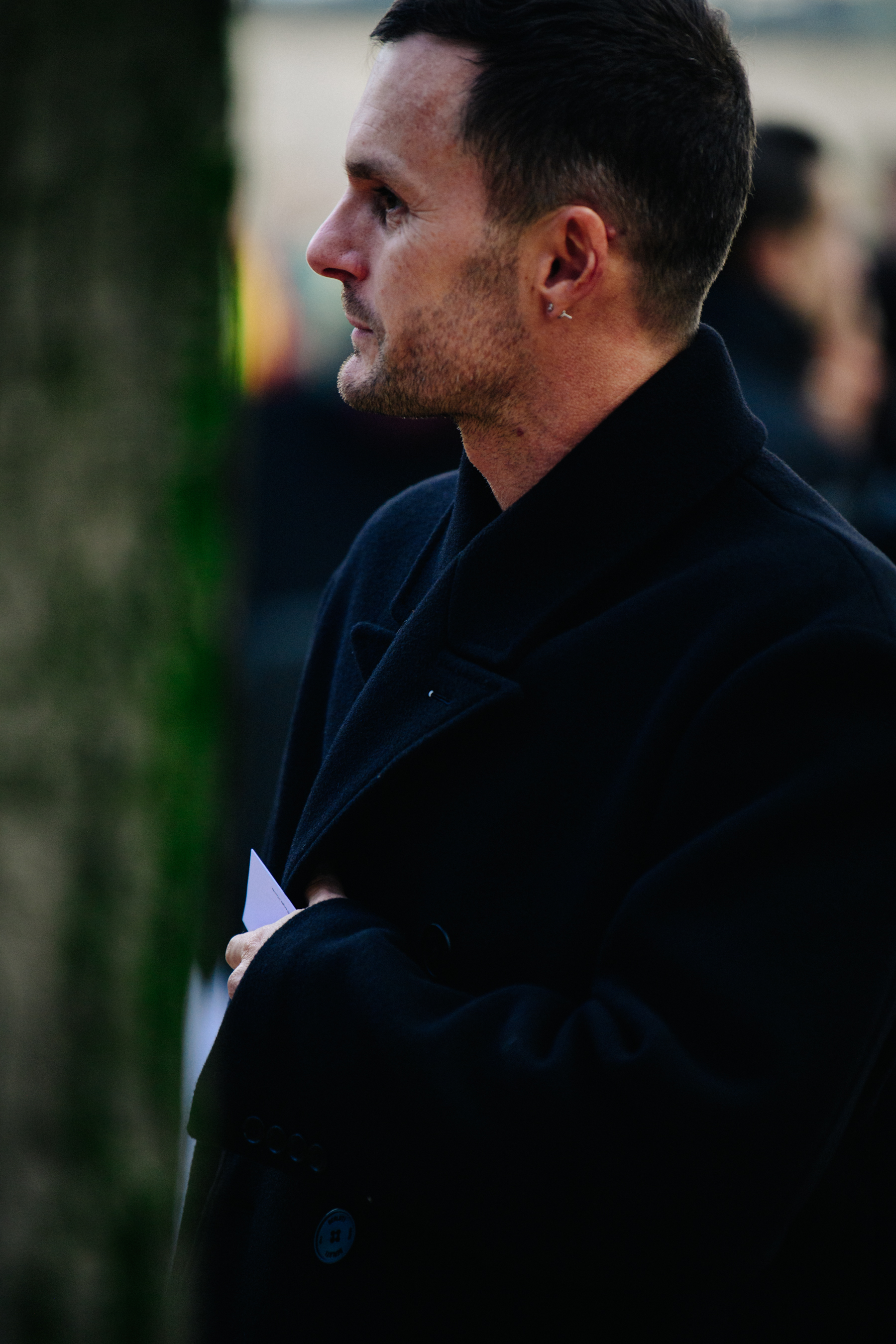 Man wearing black coat