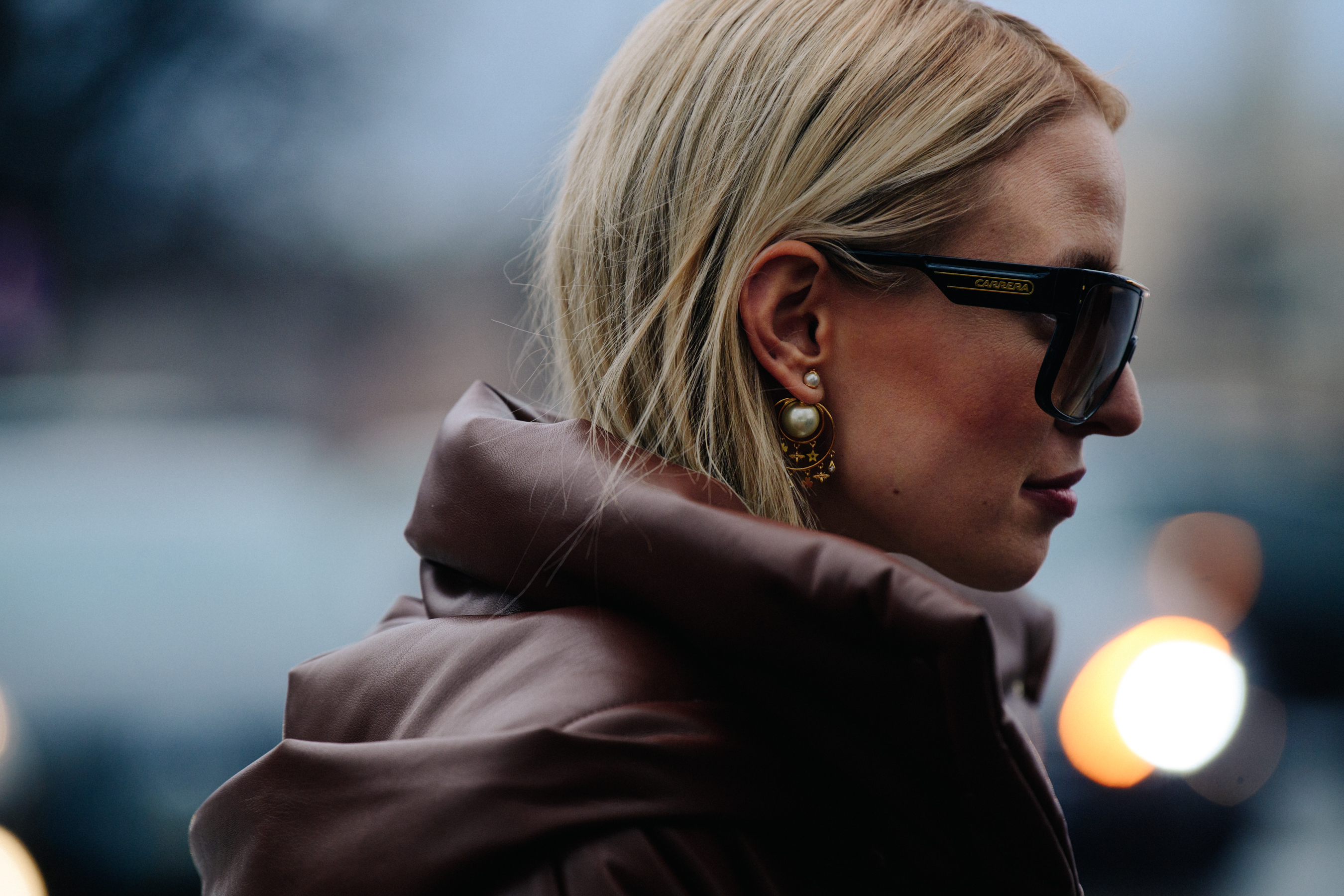 Woman wearing Carrera sunglasses