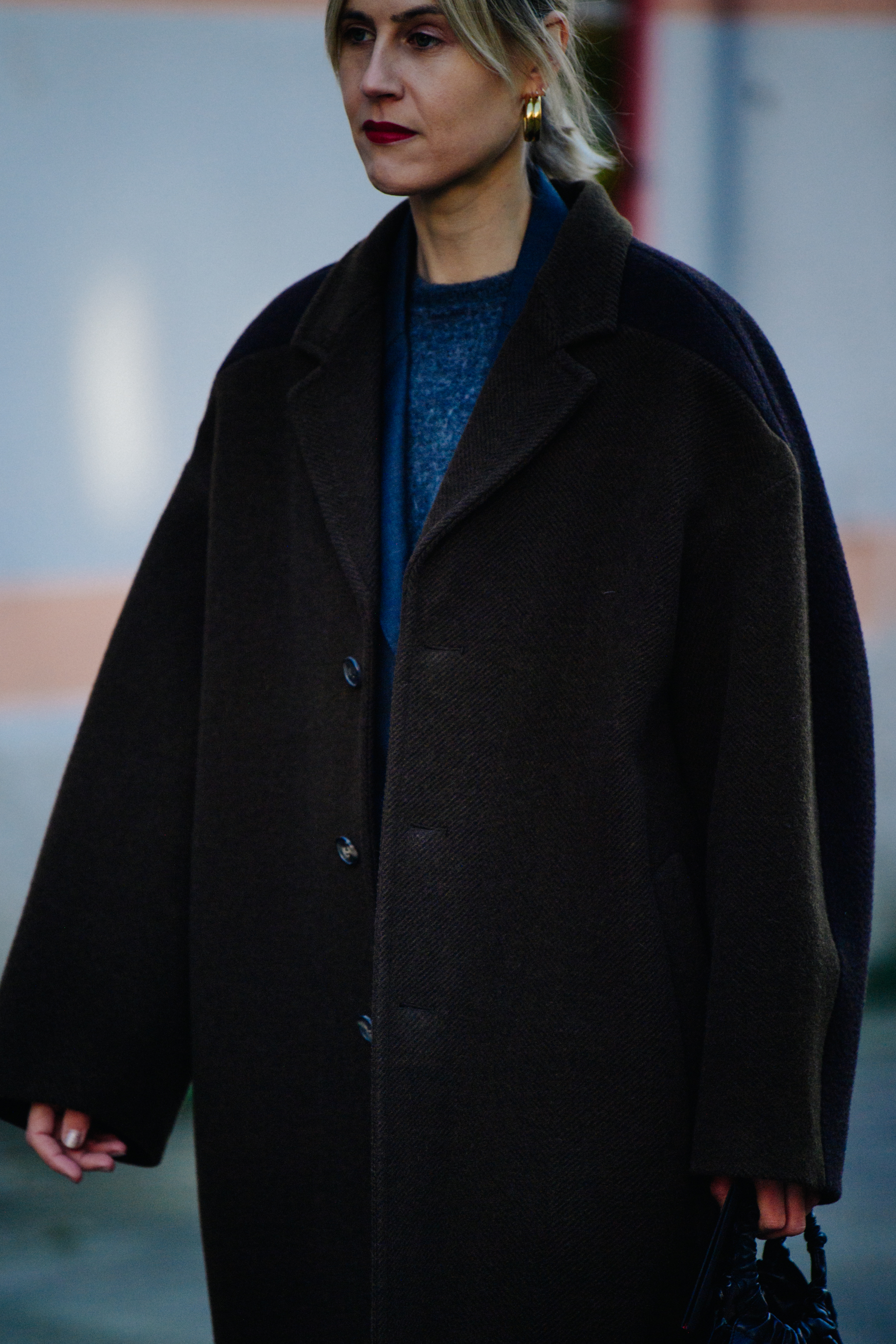 Woman wearing brown coat