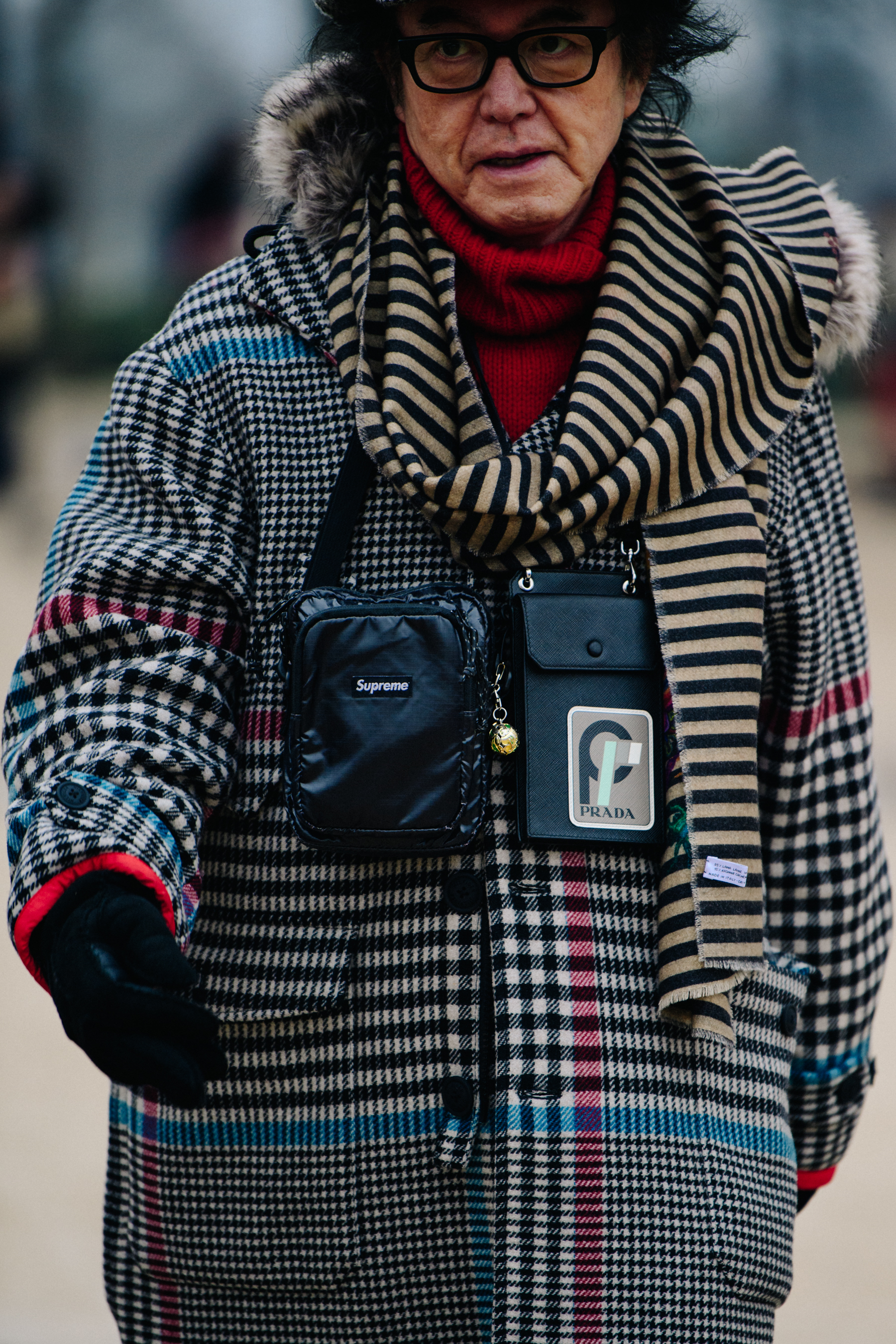 Japanese man wearing Supreme and Prada