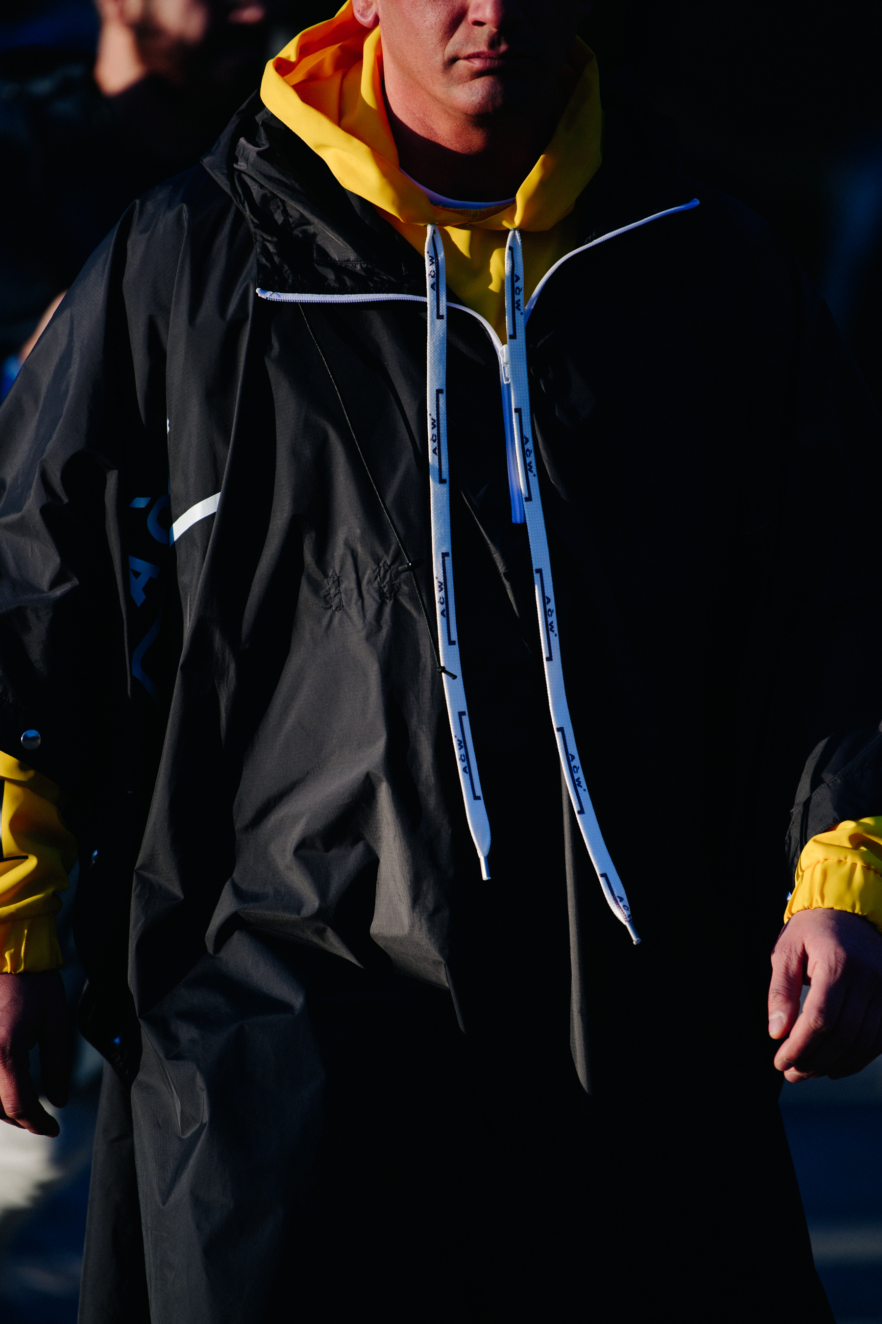 Man wearing A COLD WALL hoodie