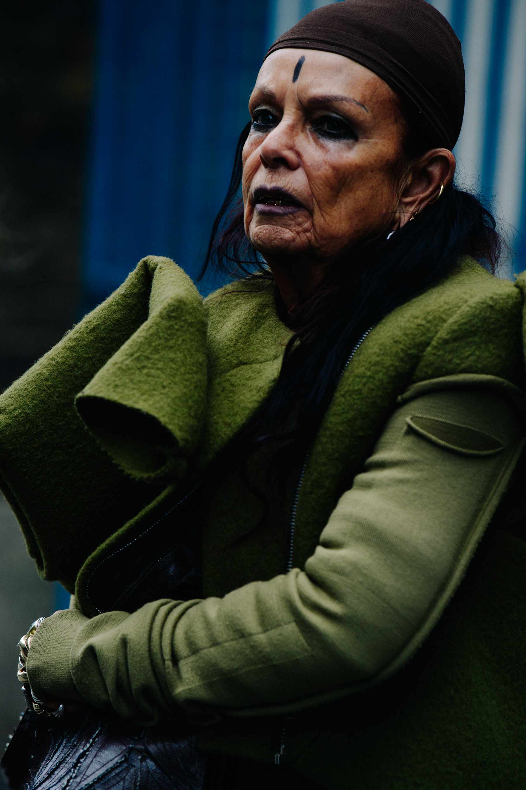 Woman wearing green jacket