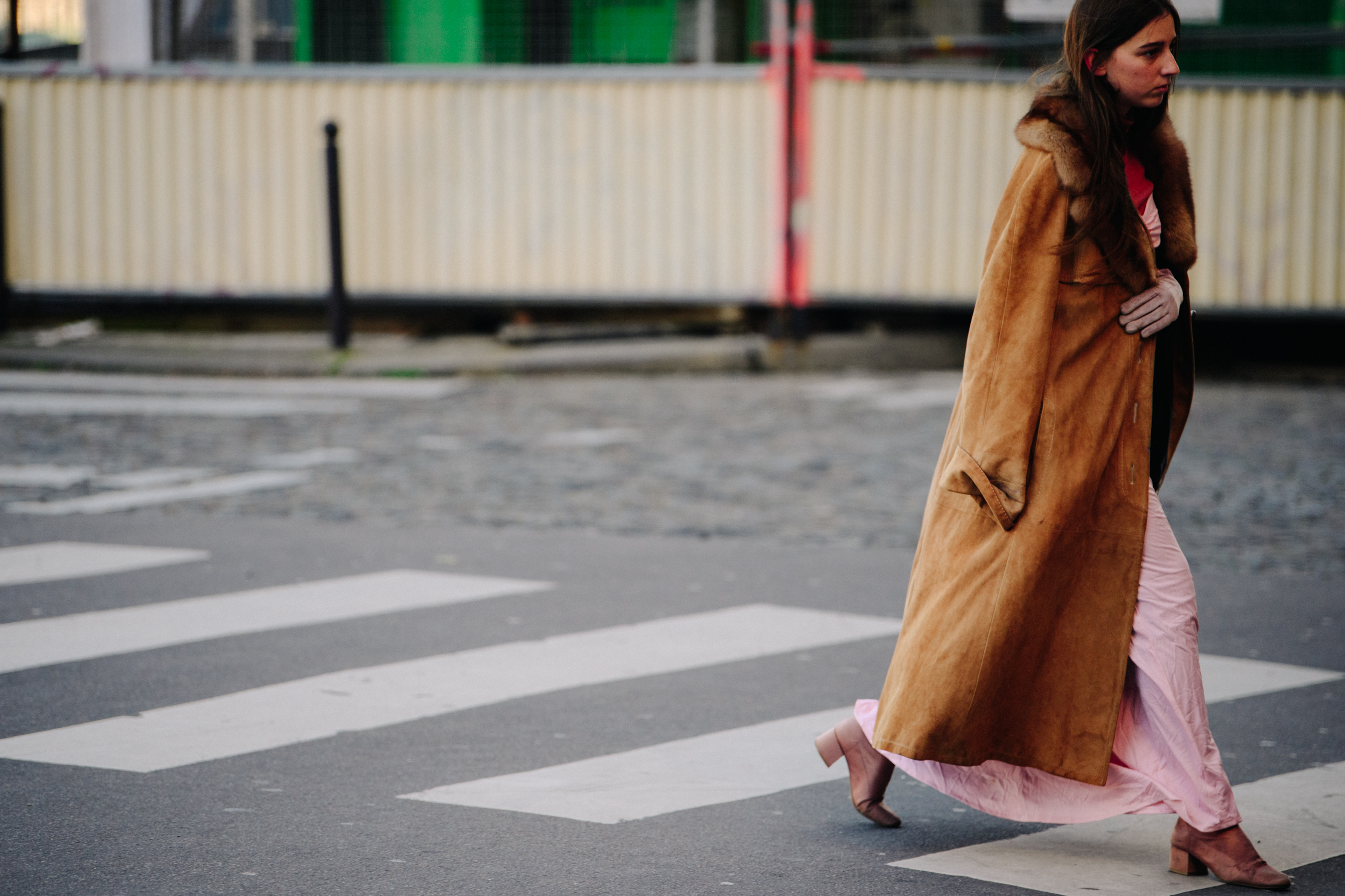 Woman wearing long fur trim coat