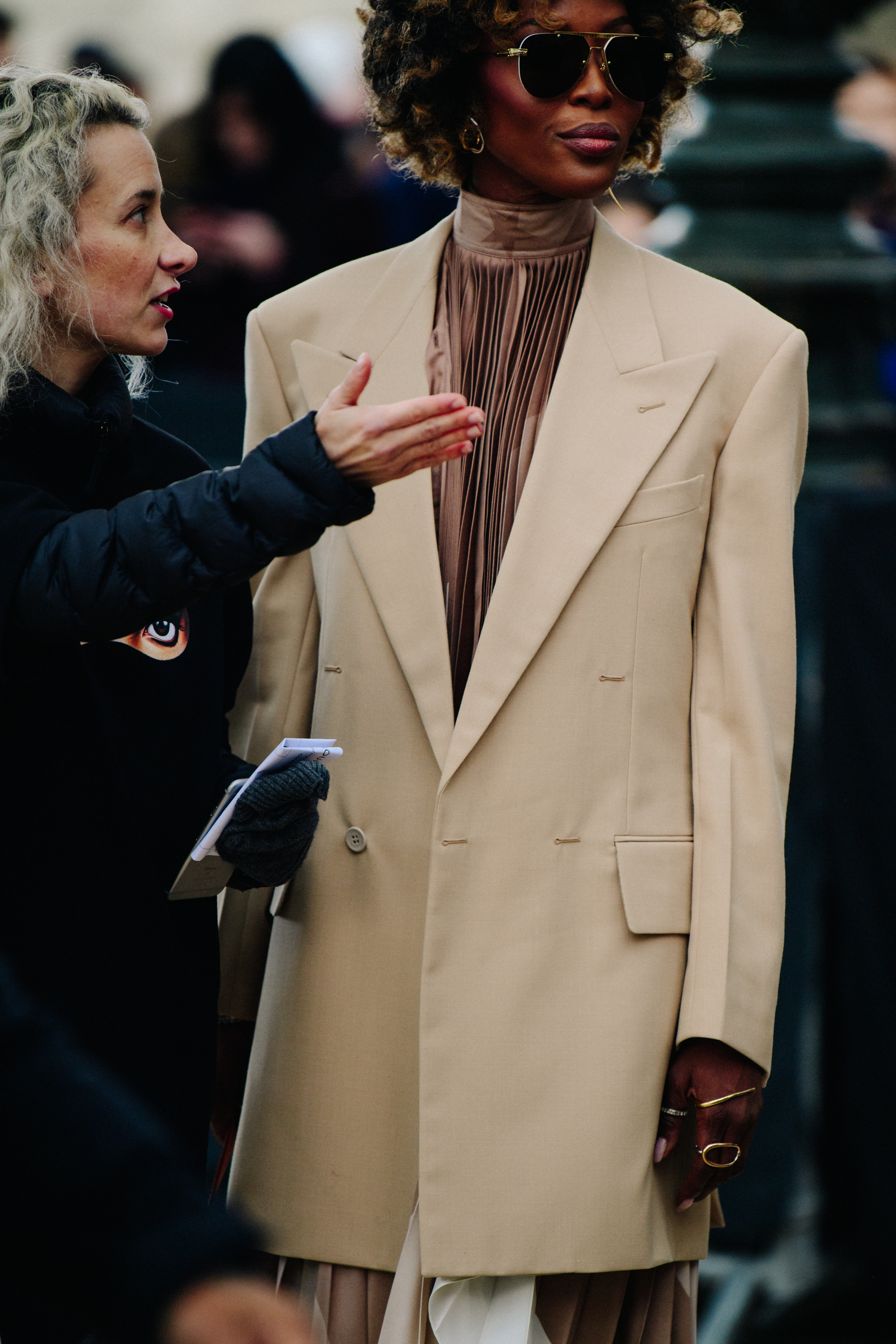 Woman wearing brown suit