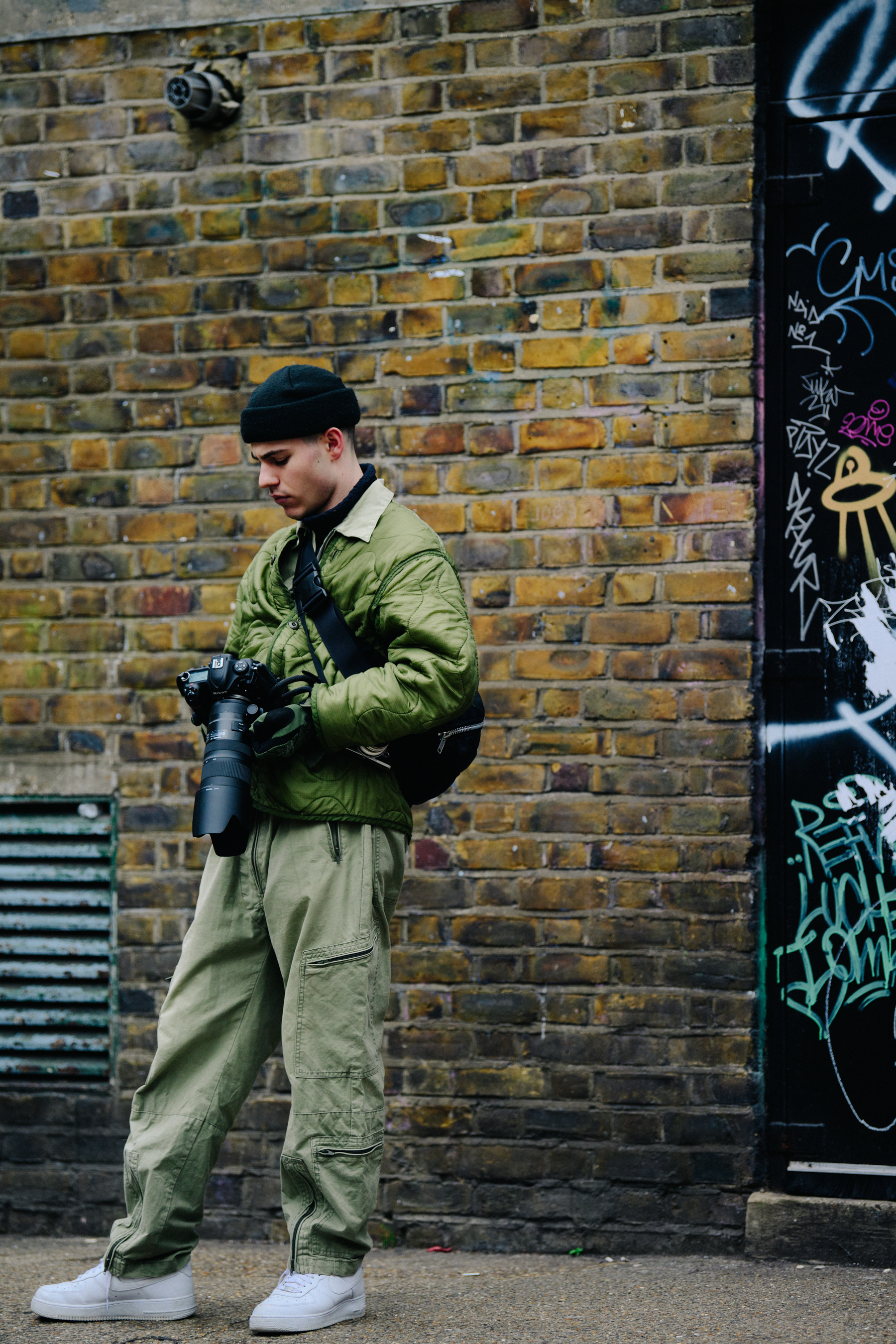 Man wearing all green outfit