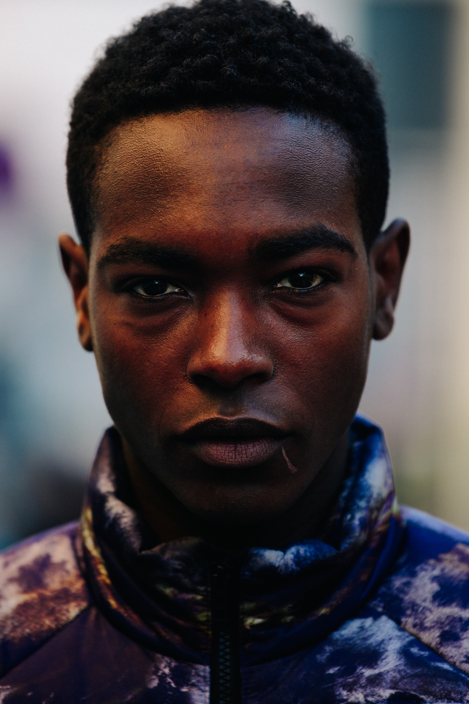 Portrait of model with short black hair