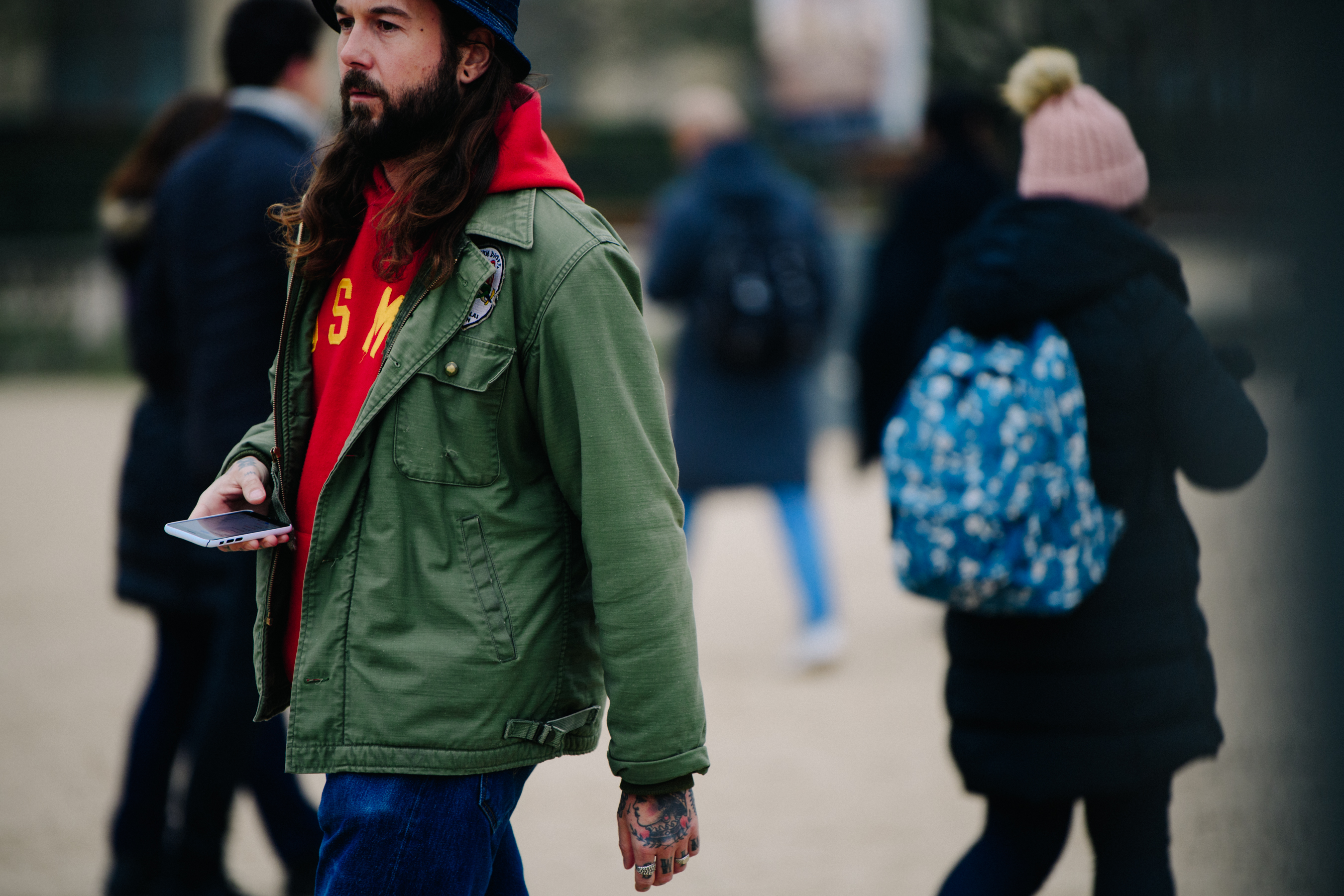 Man wearing green military jacket