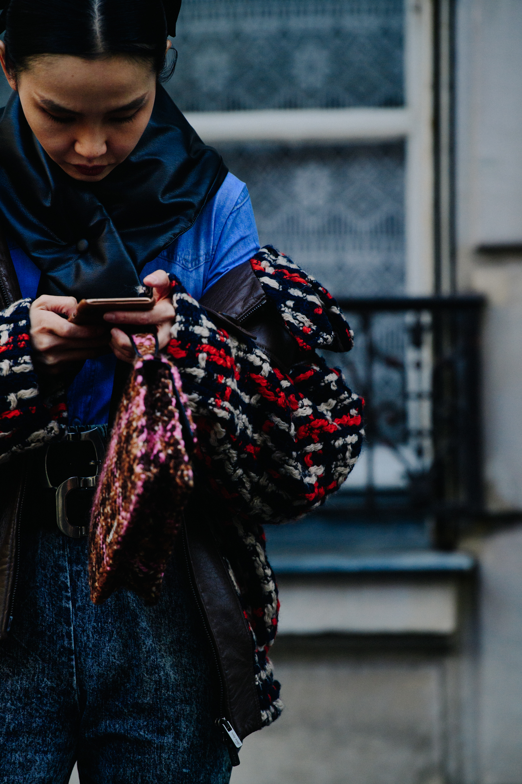 Woman carrying colourful purse
