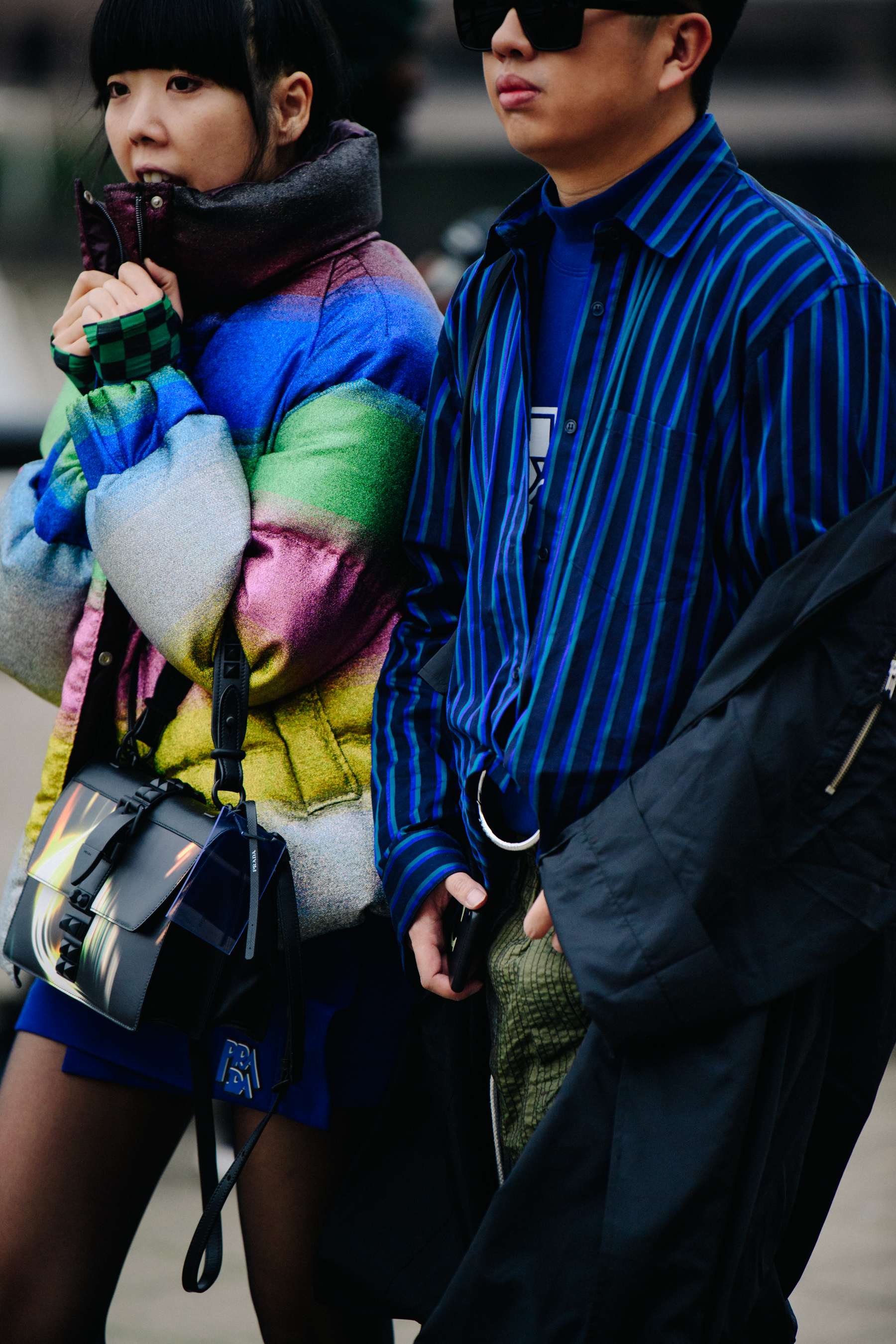 Couple wearing blue outfits