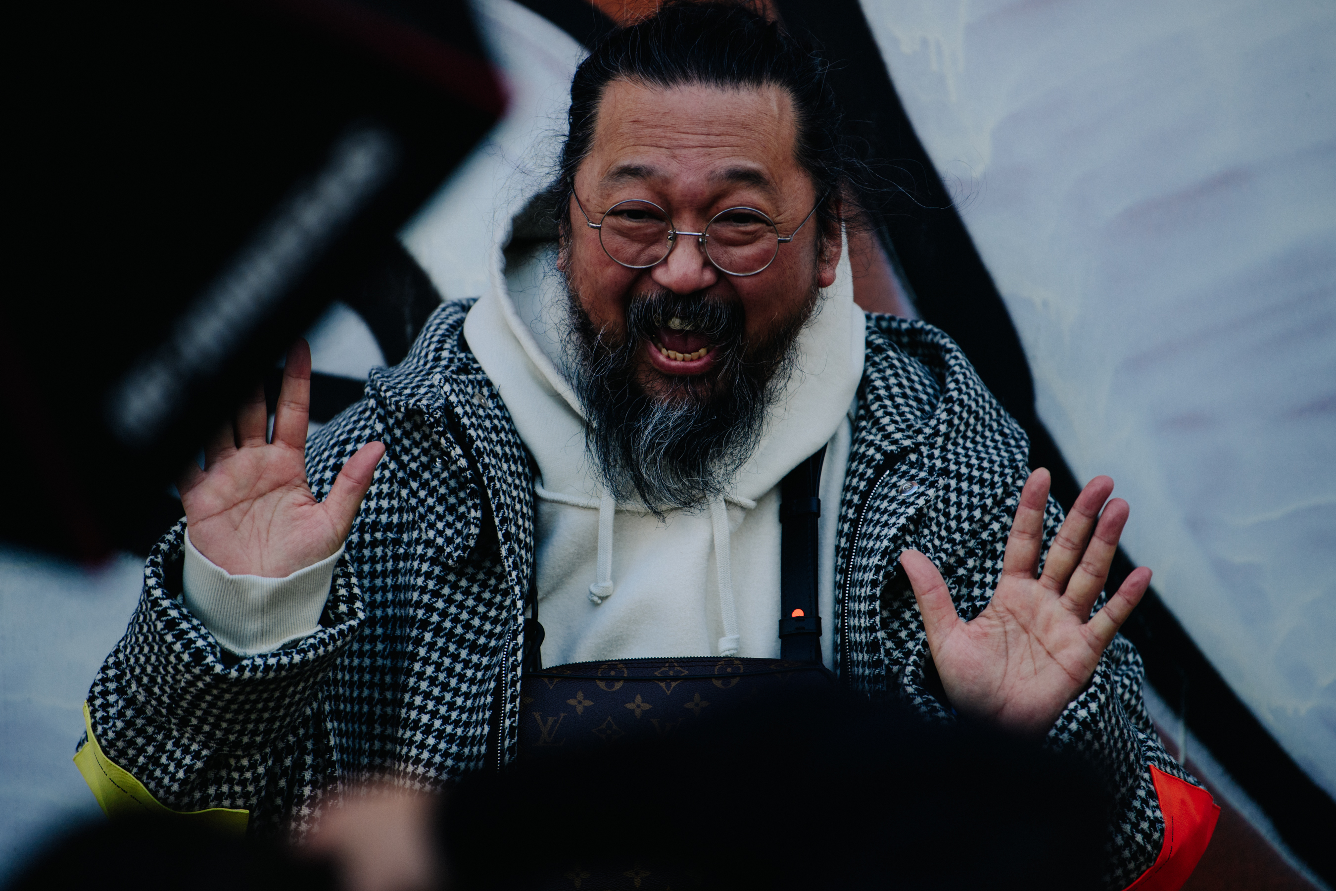 Japanese man wearing Louis Vuitton