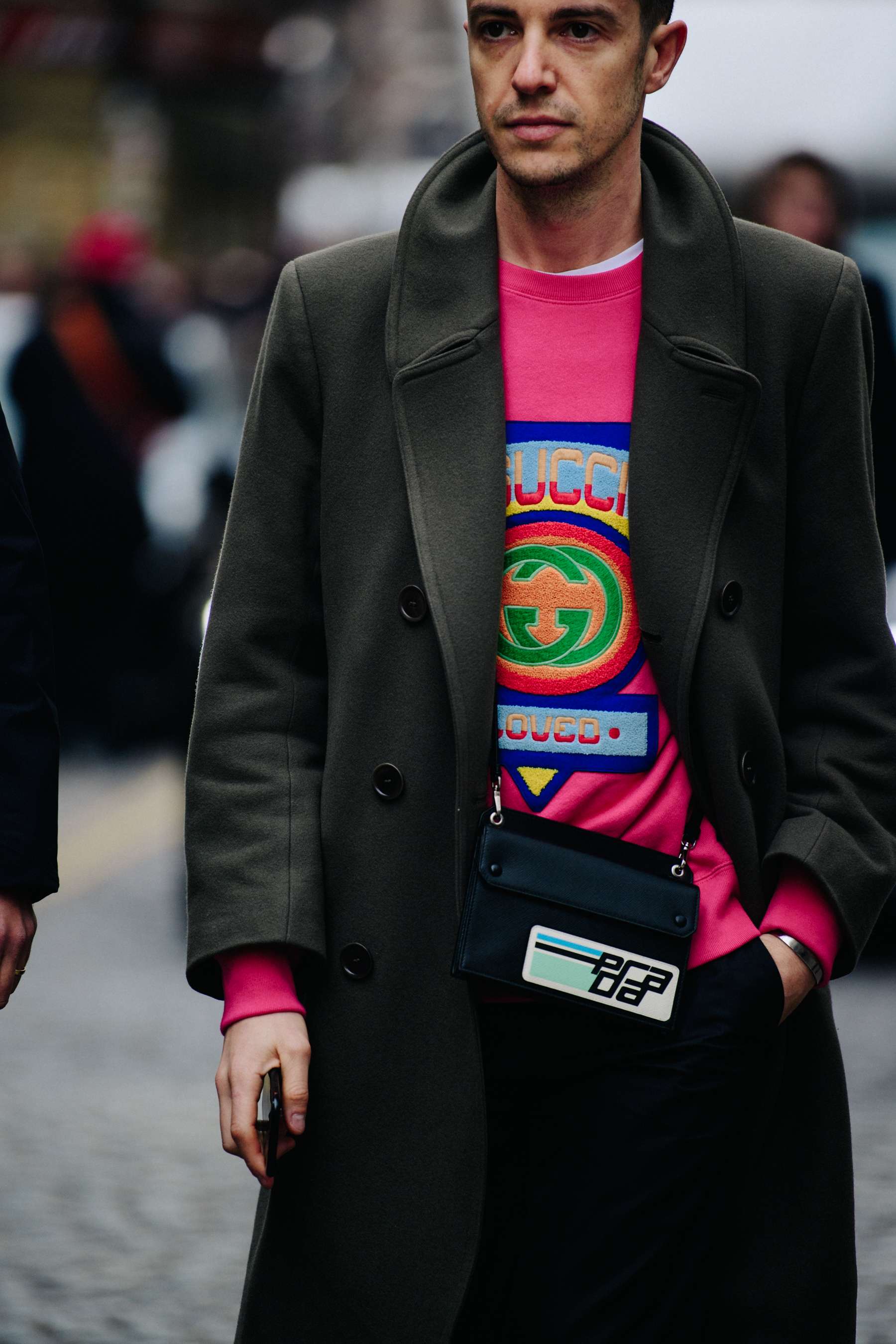 Man wearing Gucci jumper