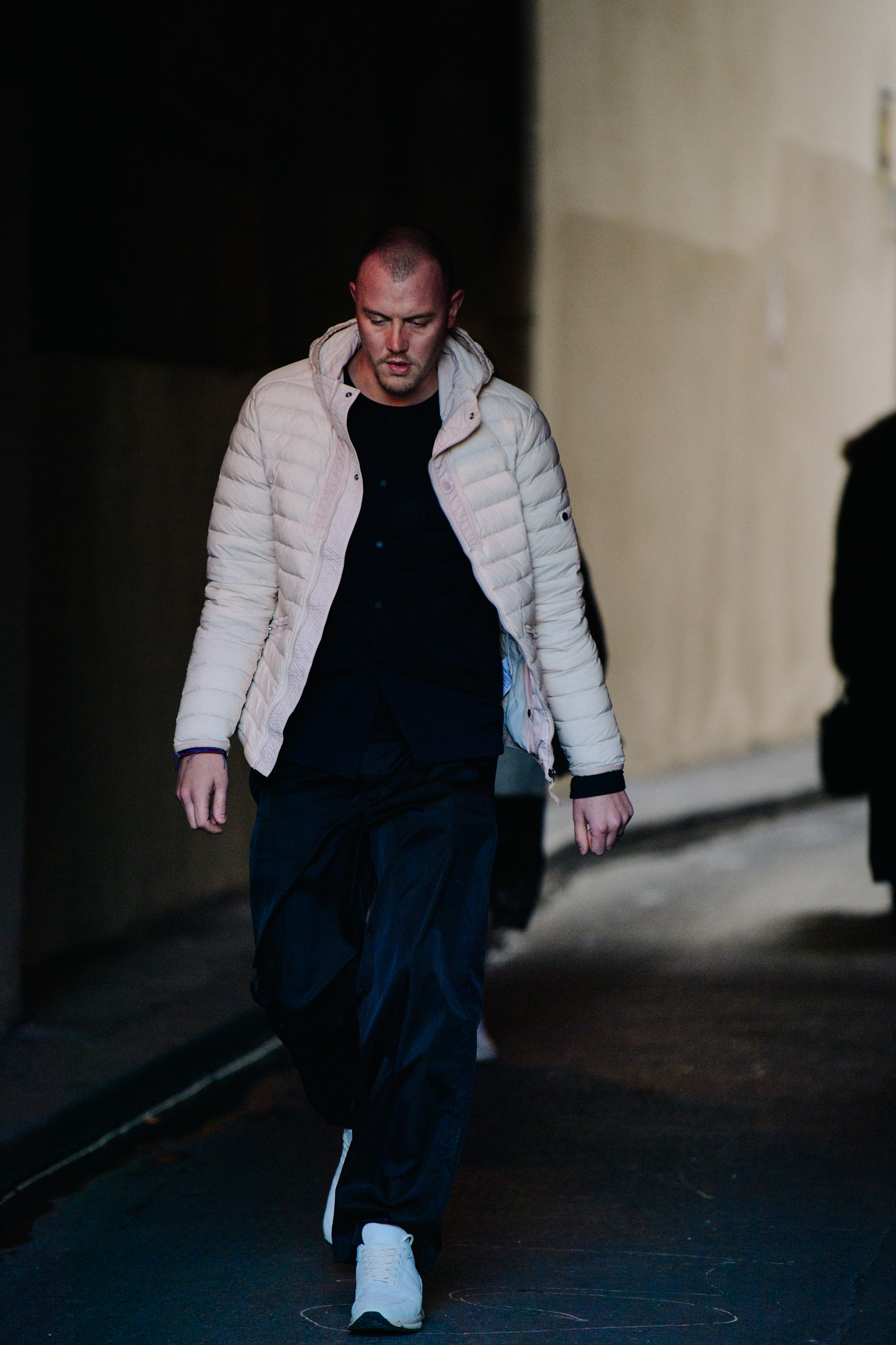 British man wearing white jacket