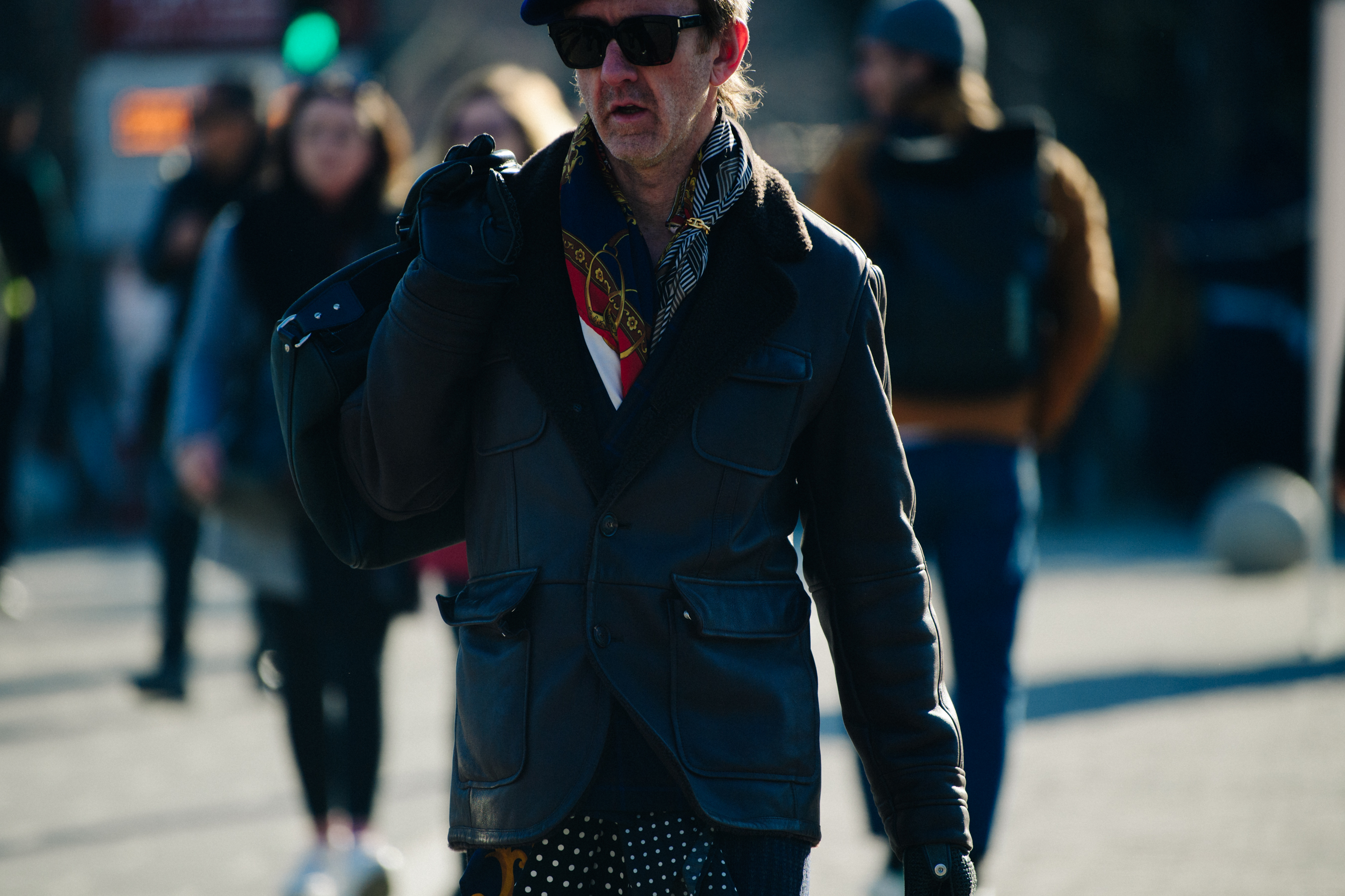 British man wearing leather coat