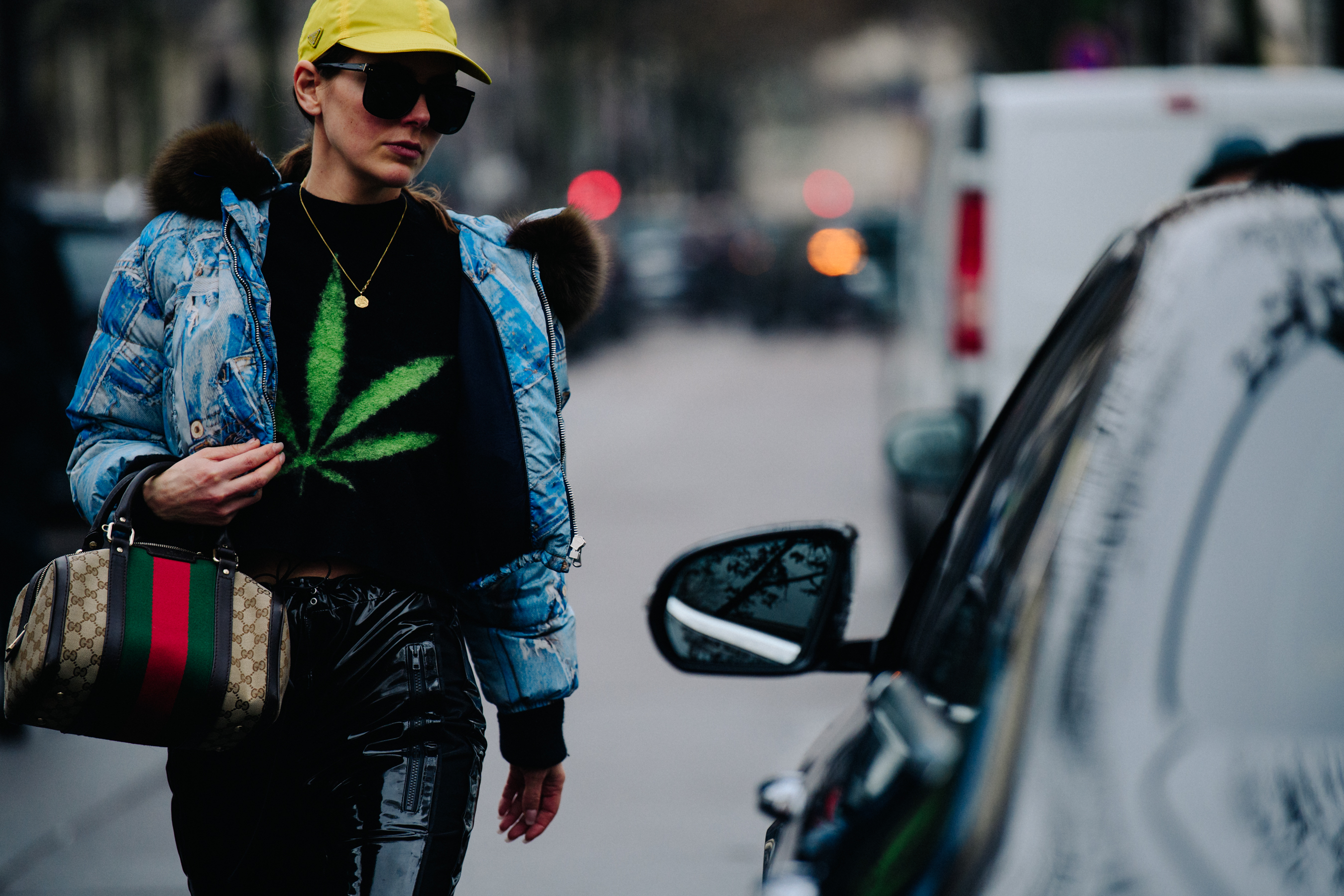 Stylist carrying Gucci bag