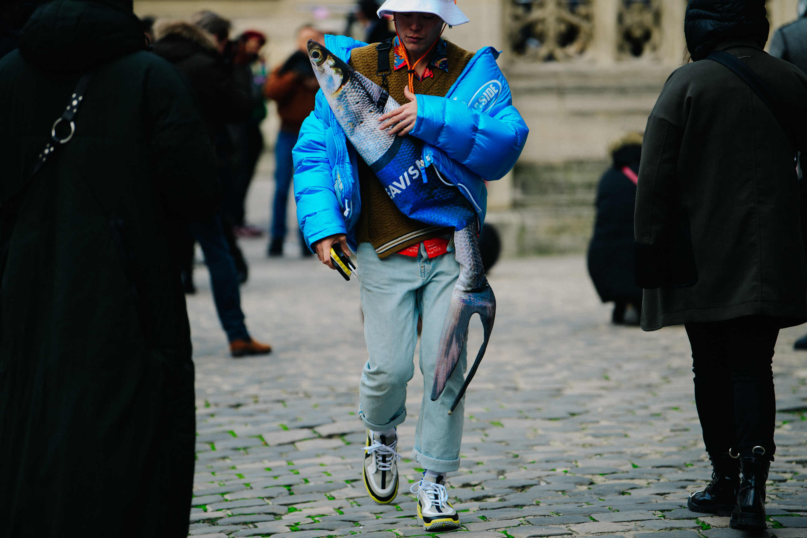 Japanese man carrying fish bag