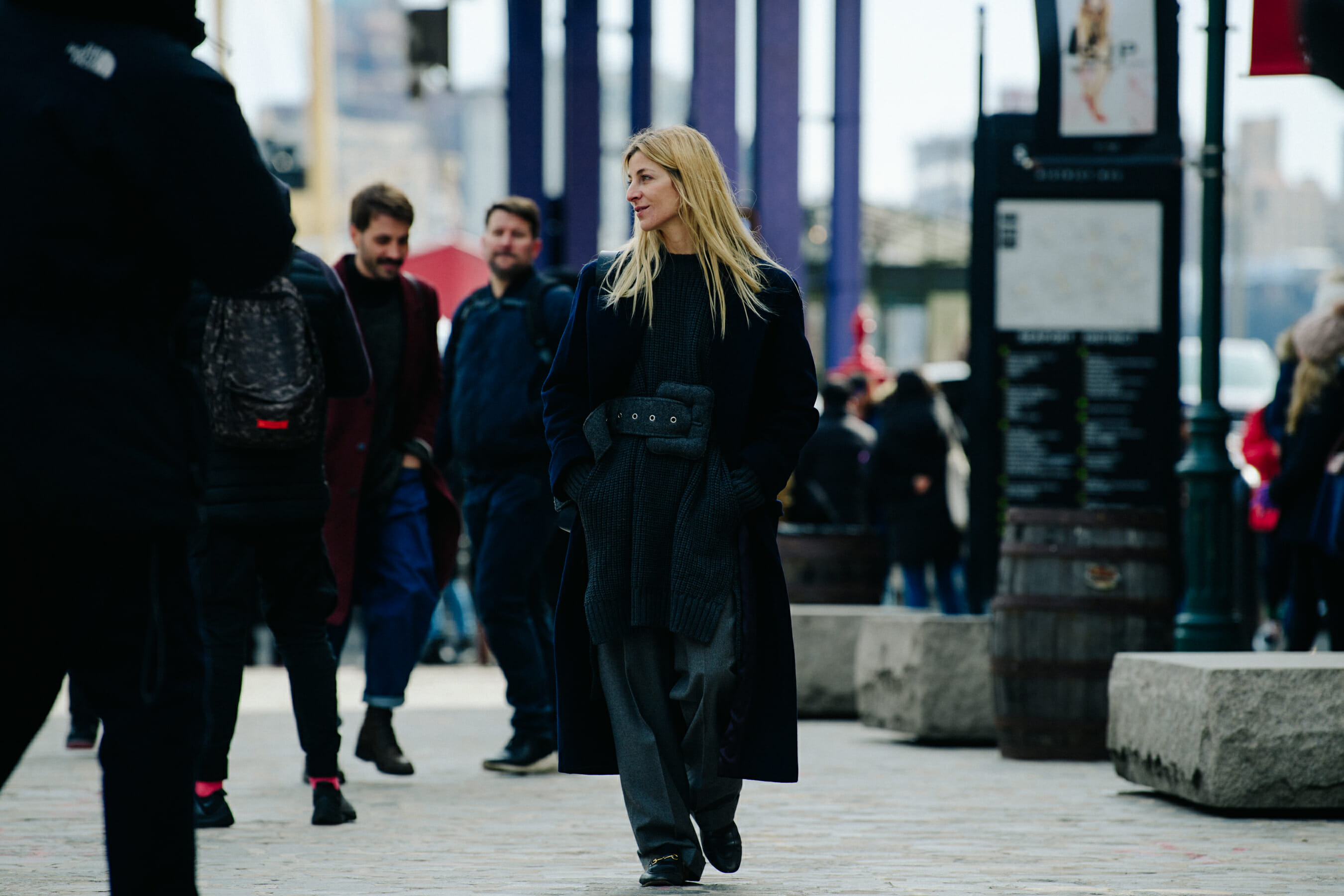 Woman wearing dark outfit