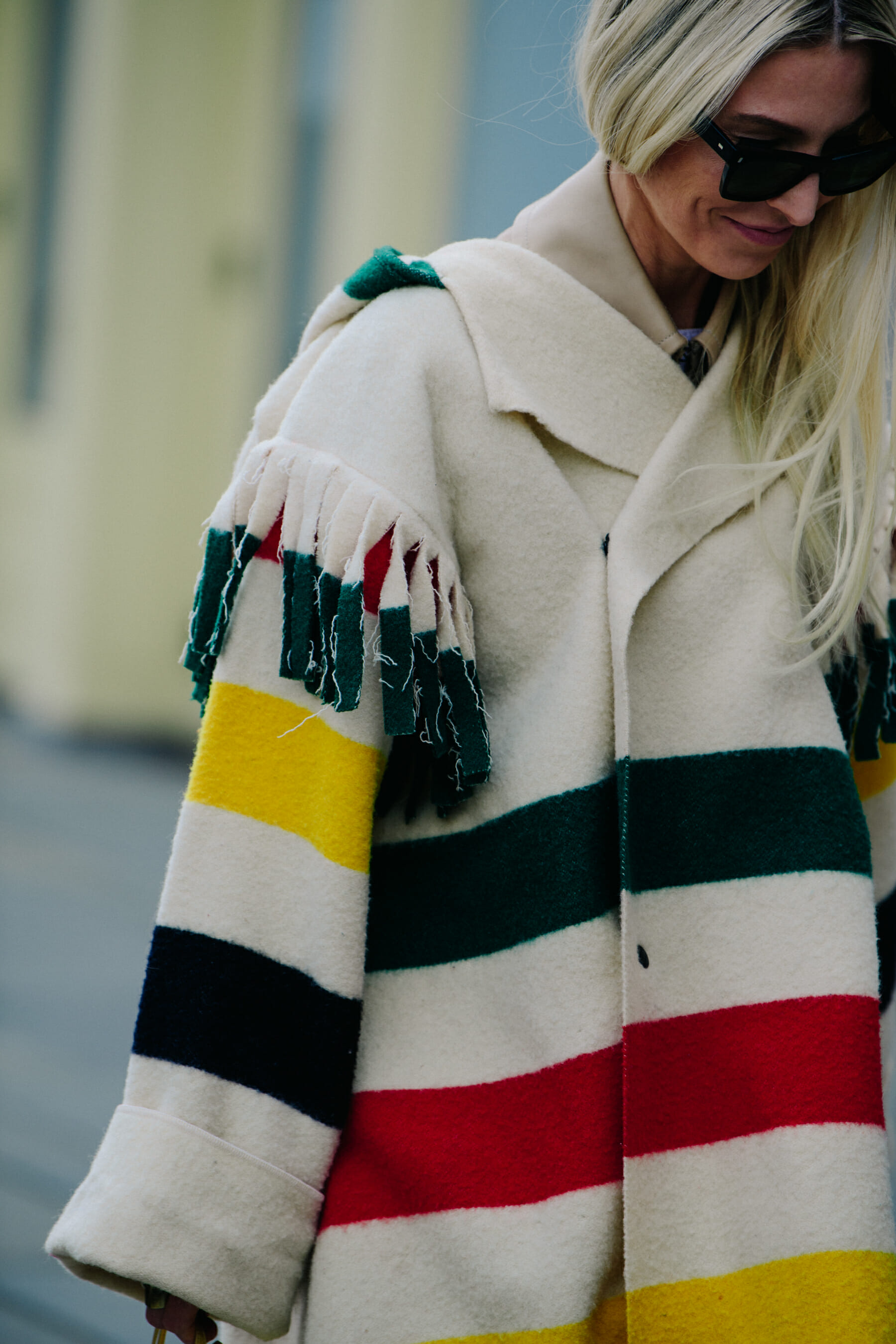 Woman wearing striped jacket