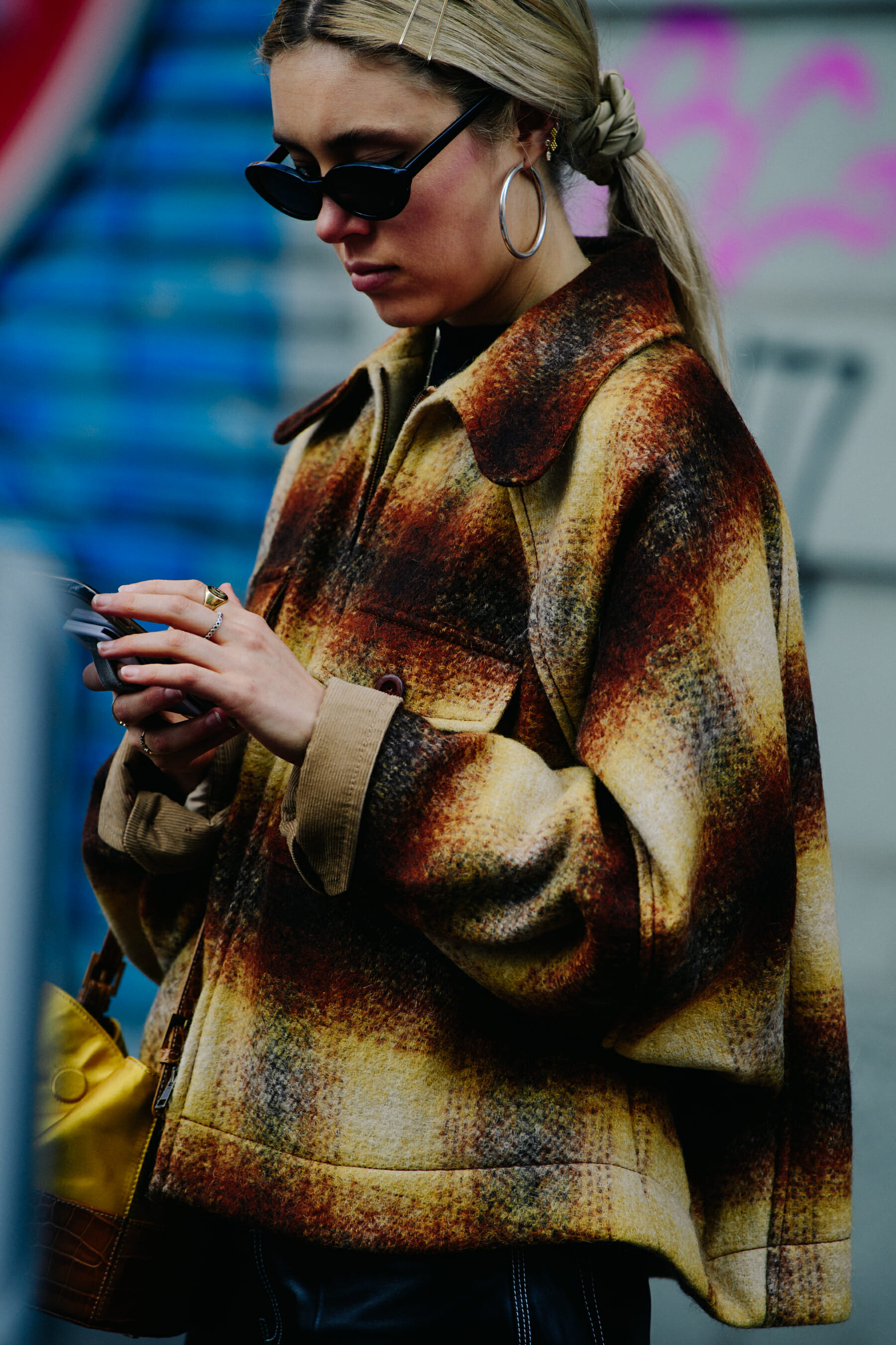 Woman wearing check jacket
