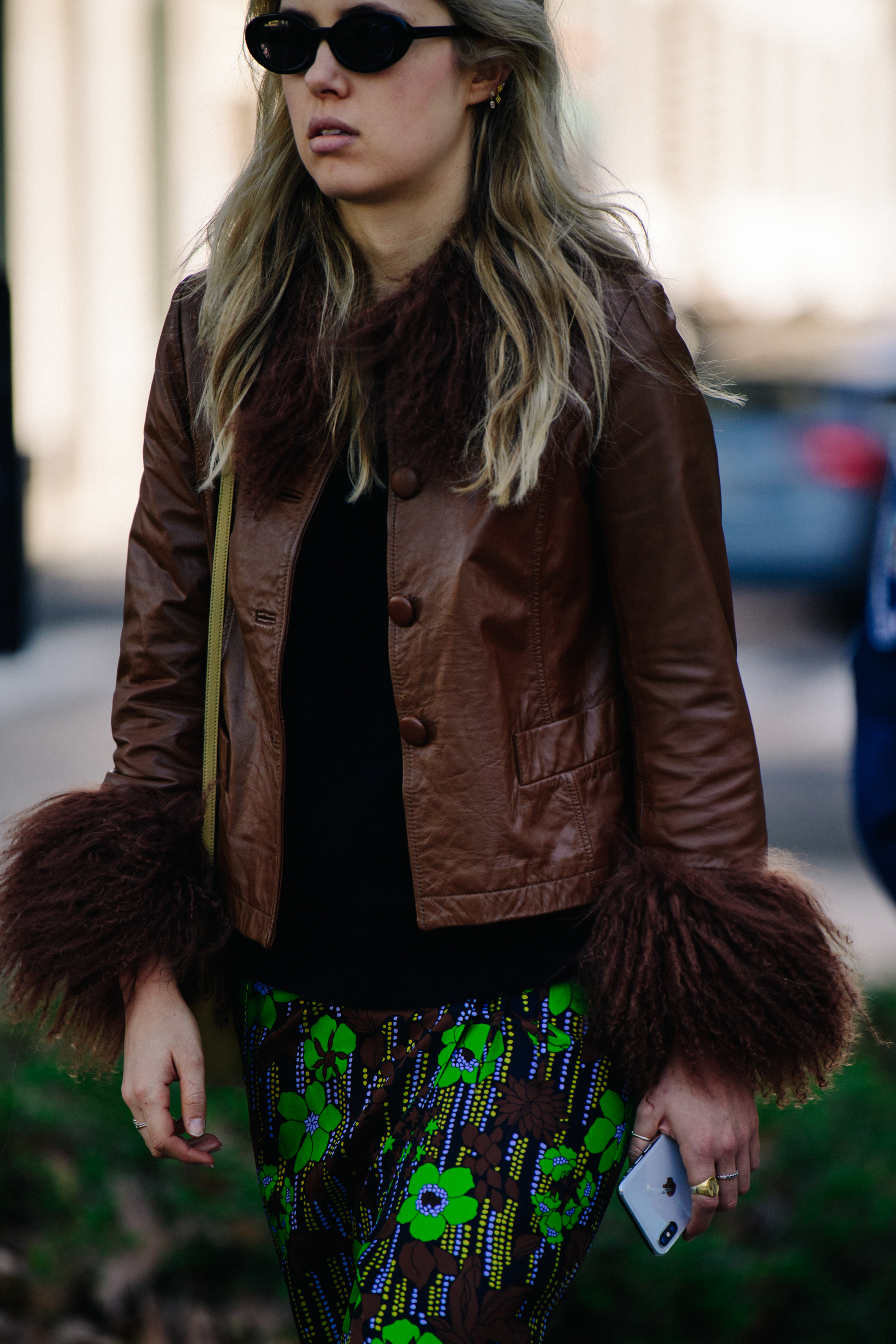Woman wearing brown leather jacket