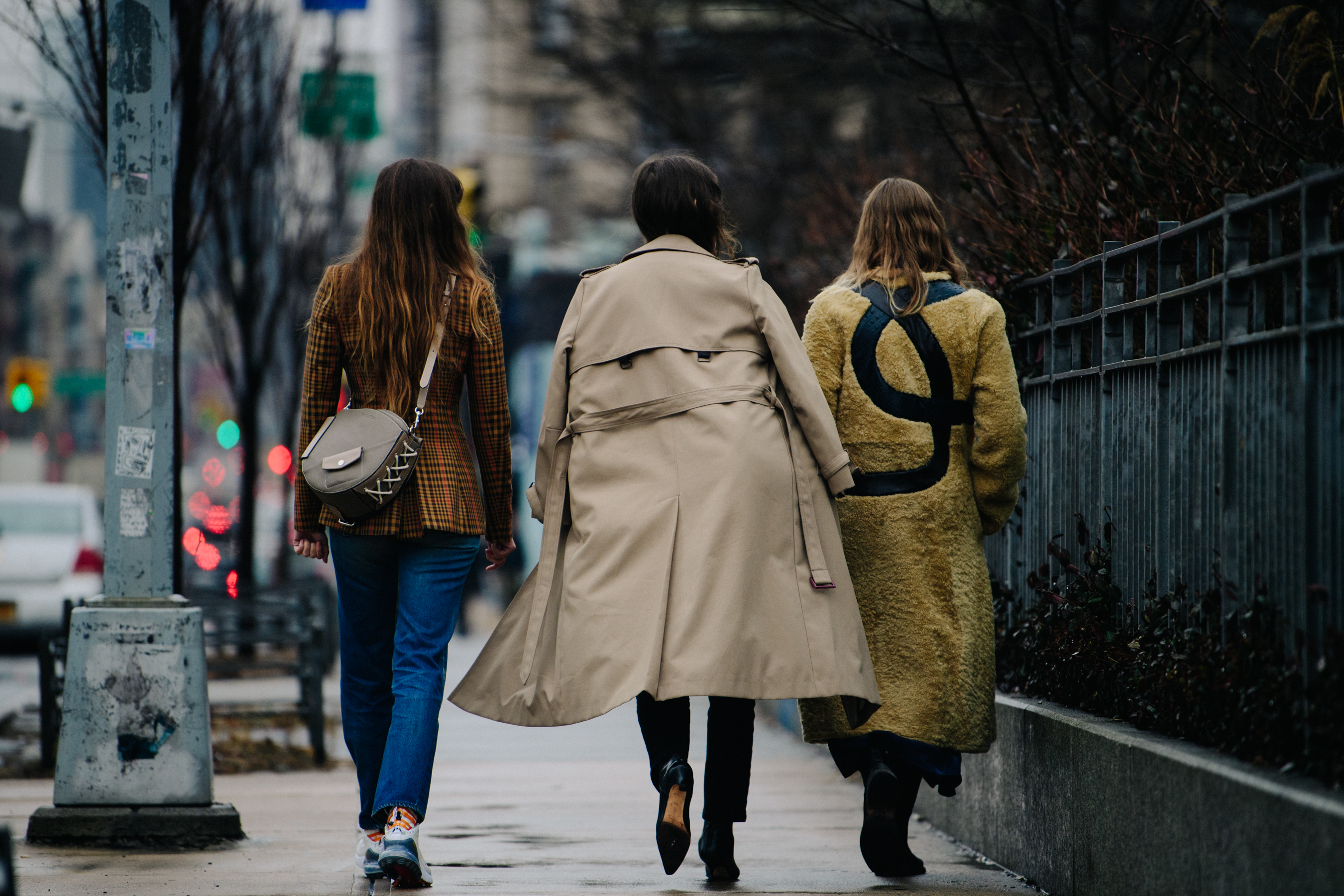 Three bloggers wearing winter coats