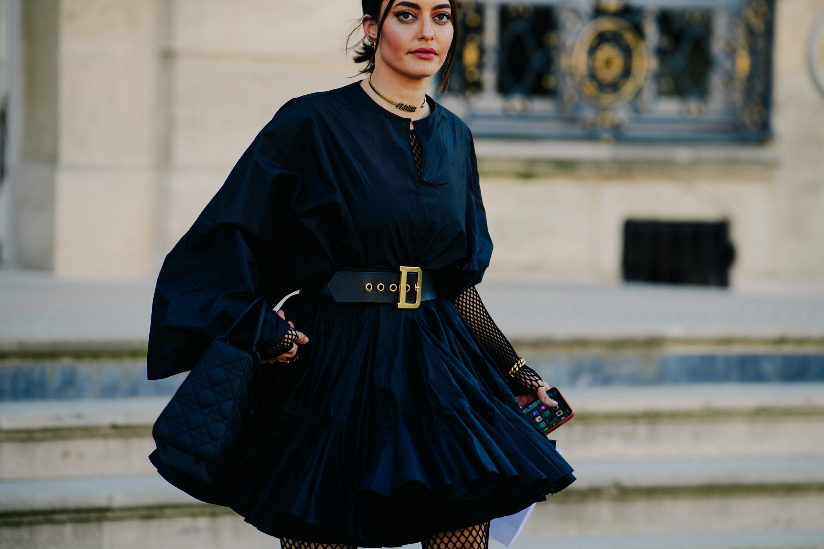 Woman wearing Christian Dior outfit