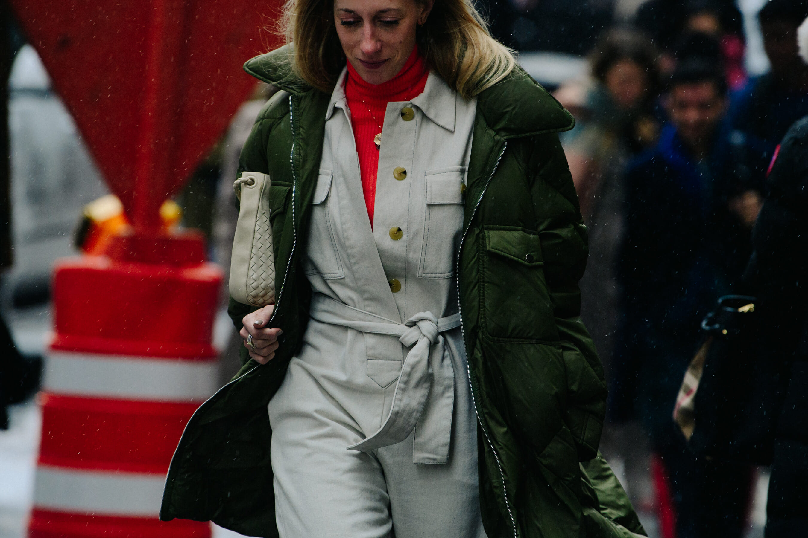 Woman wearing green puffer coat