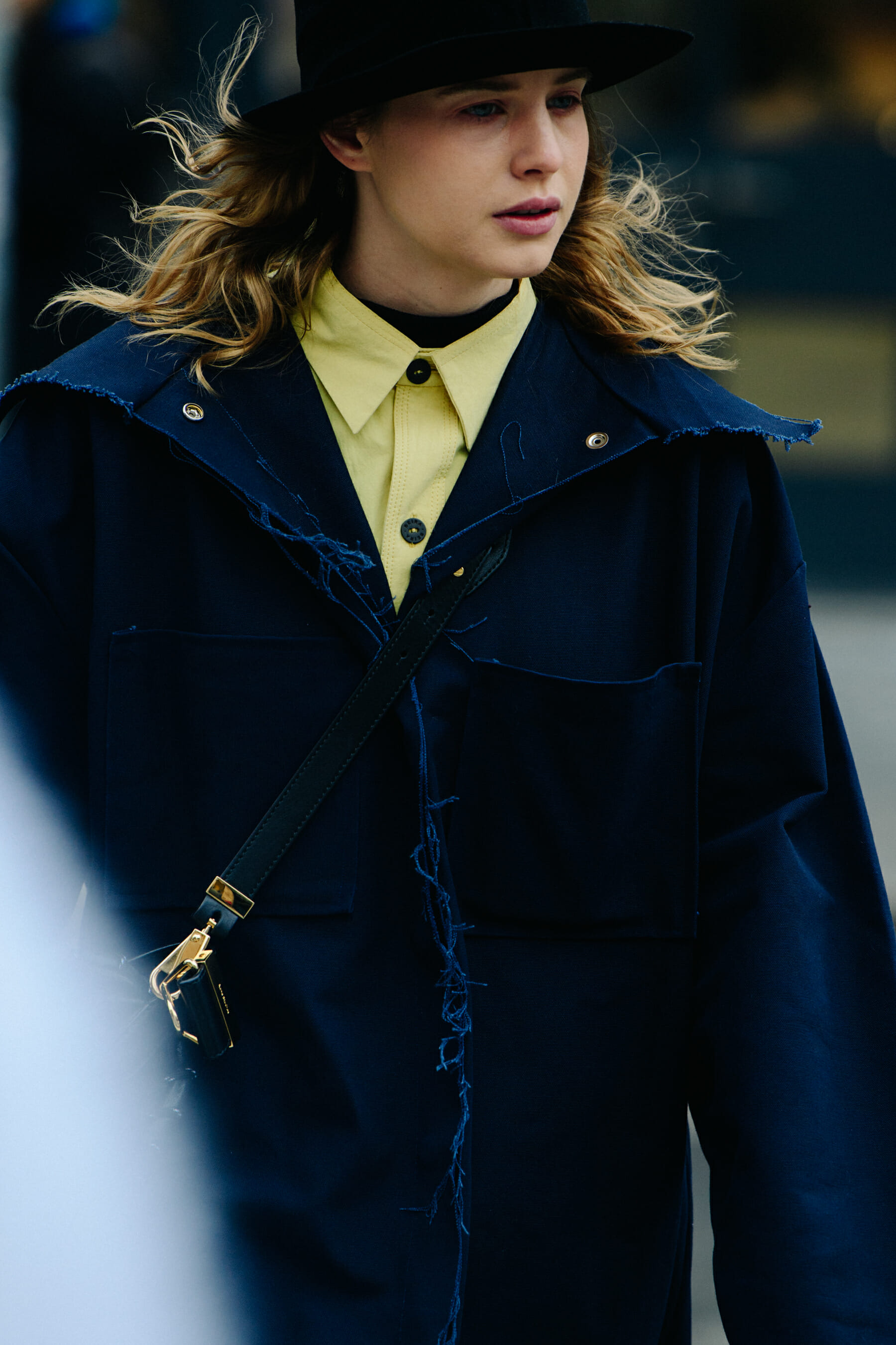 Woman wearing blue denim coat