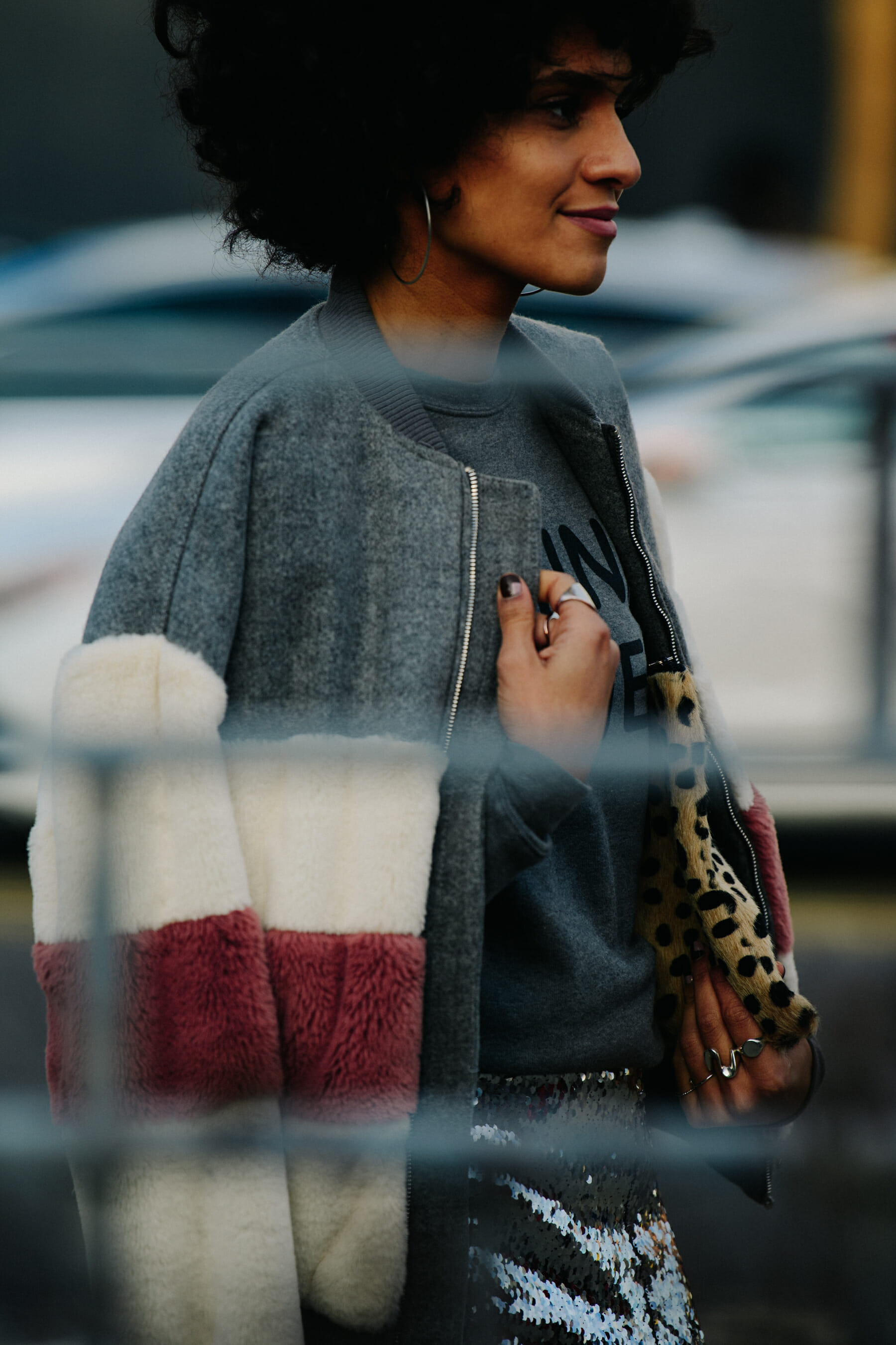 Woman wearing colourful fur jacket
