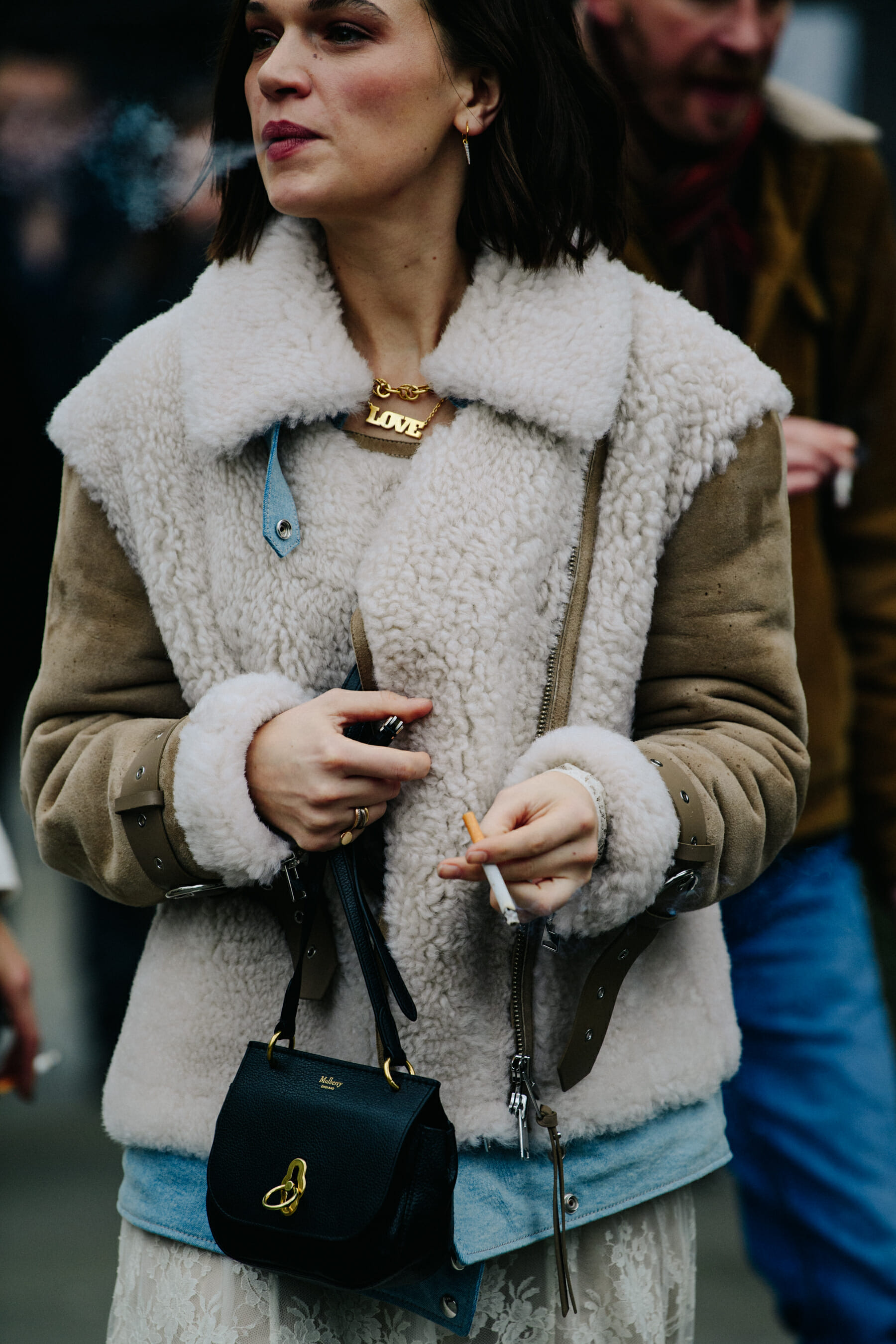 Woman wearing fur trim coat