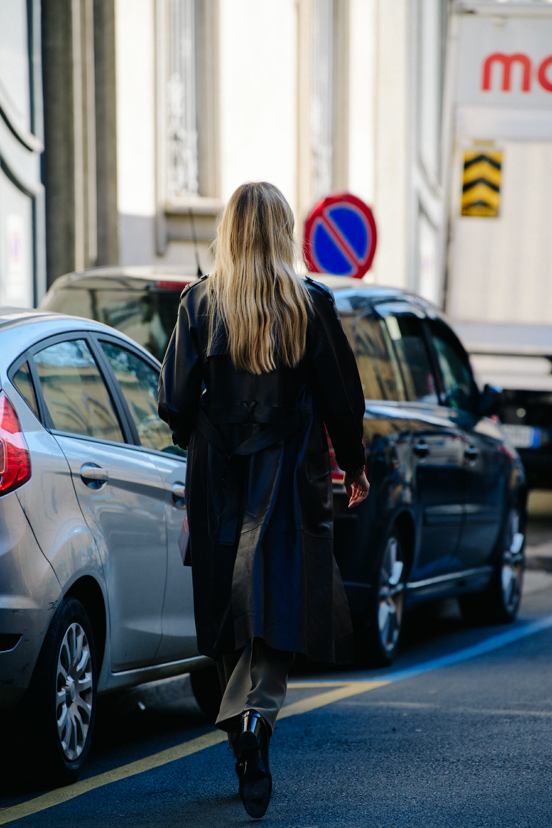 Woman wearing dark leather coat