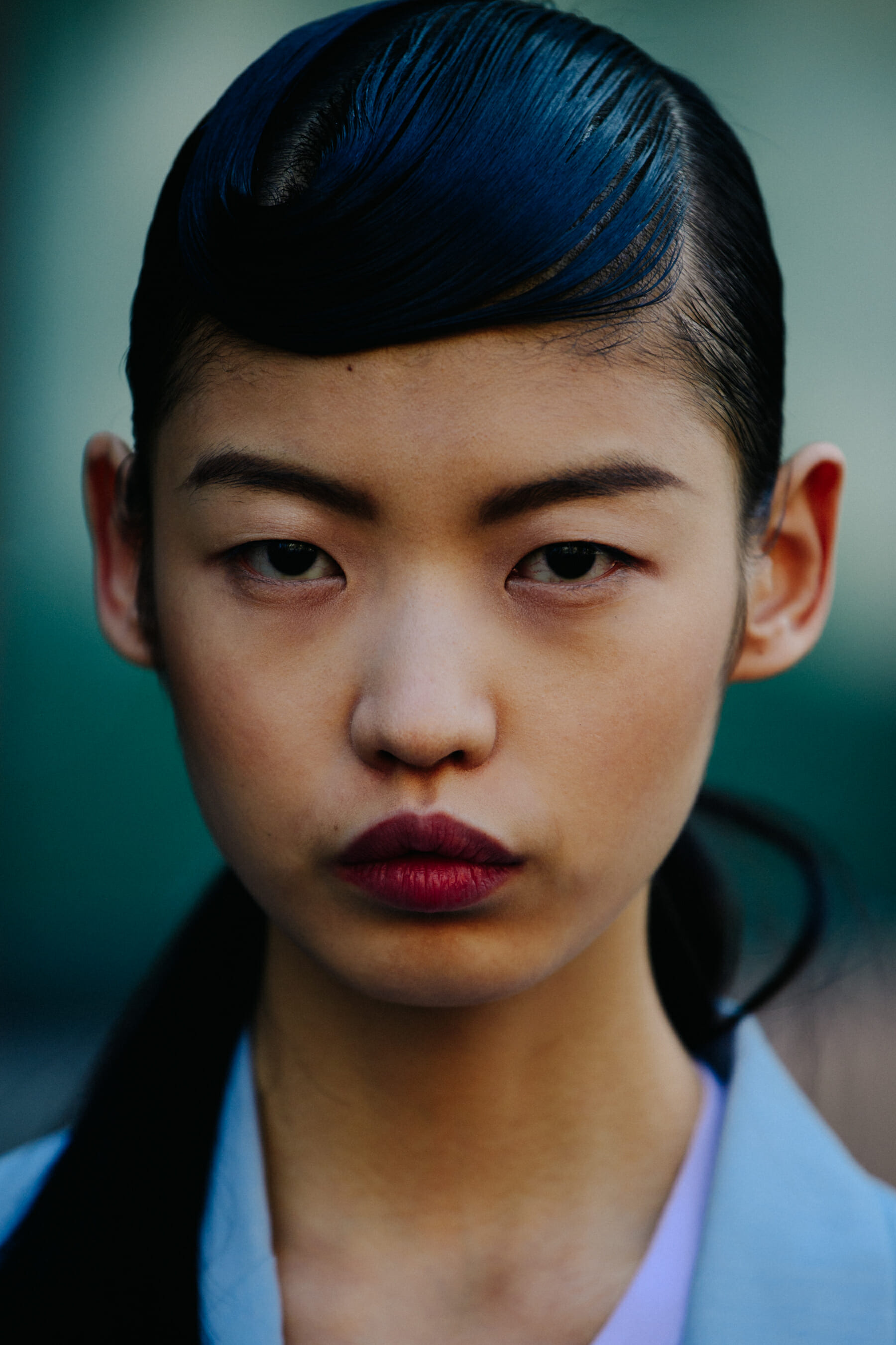 Portrait of model with slick hair