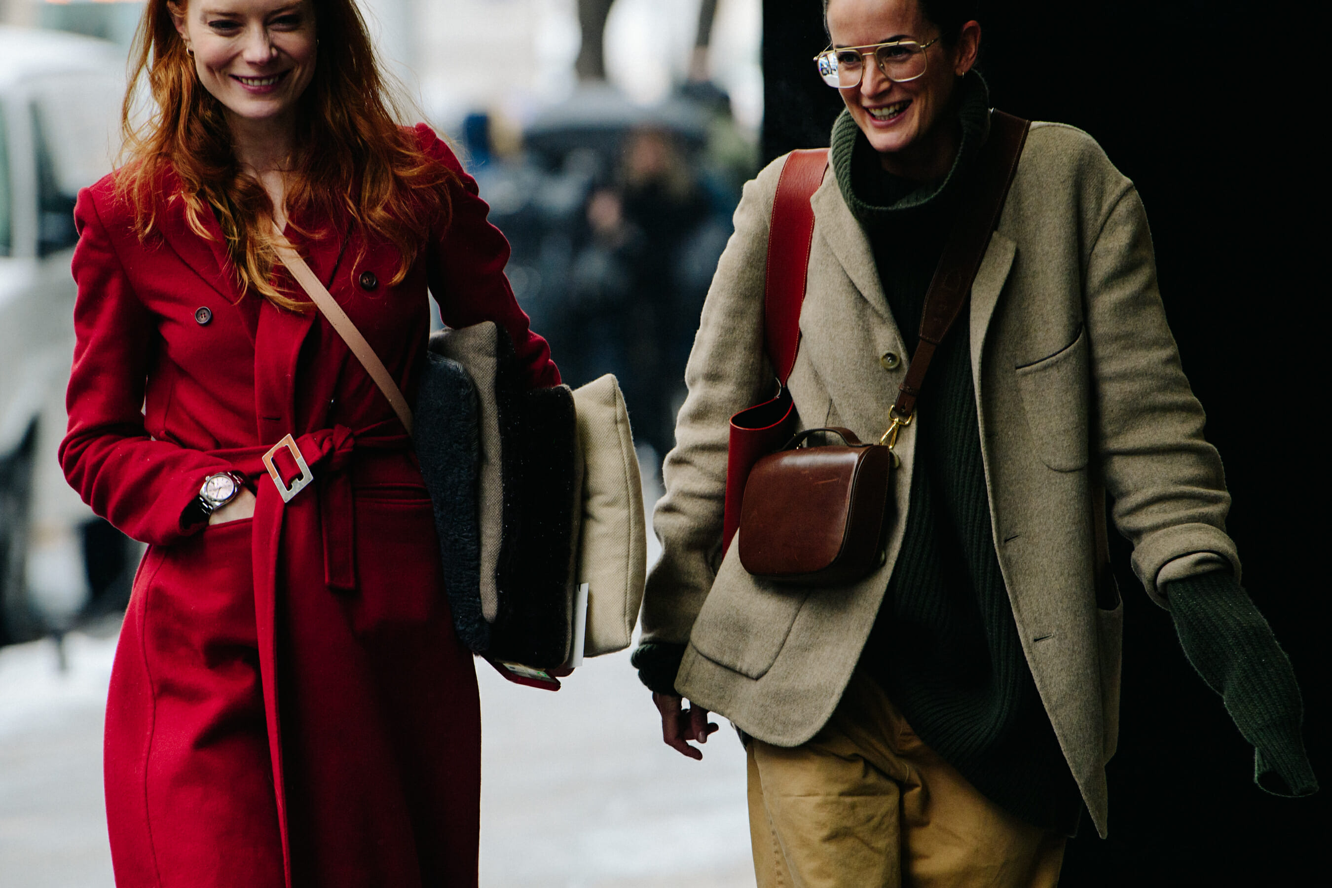 Two women wearing wool coats