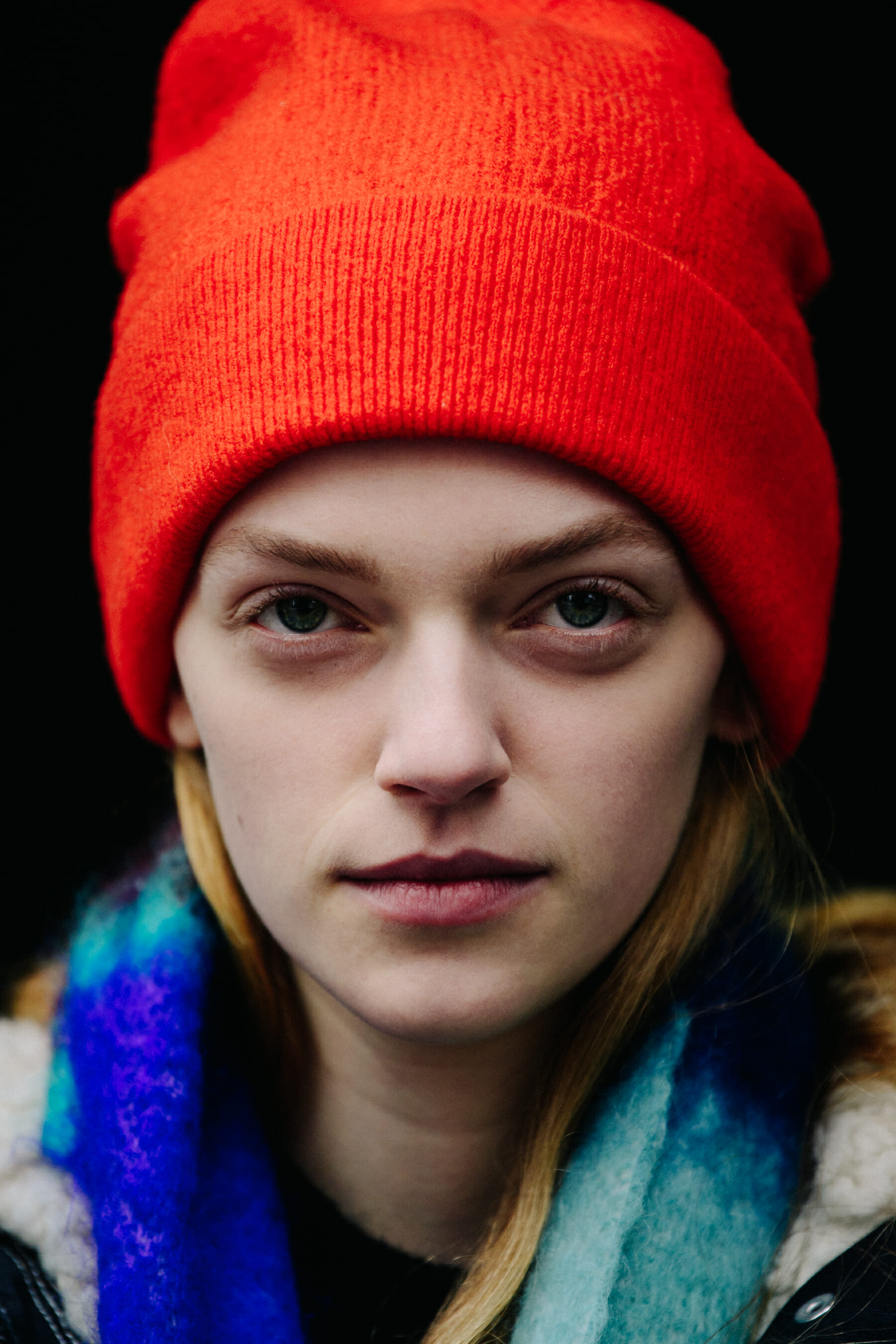 Portrait of model wearing orange beanie