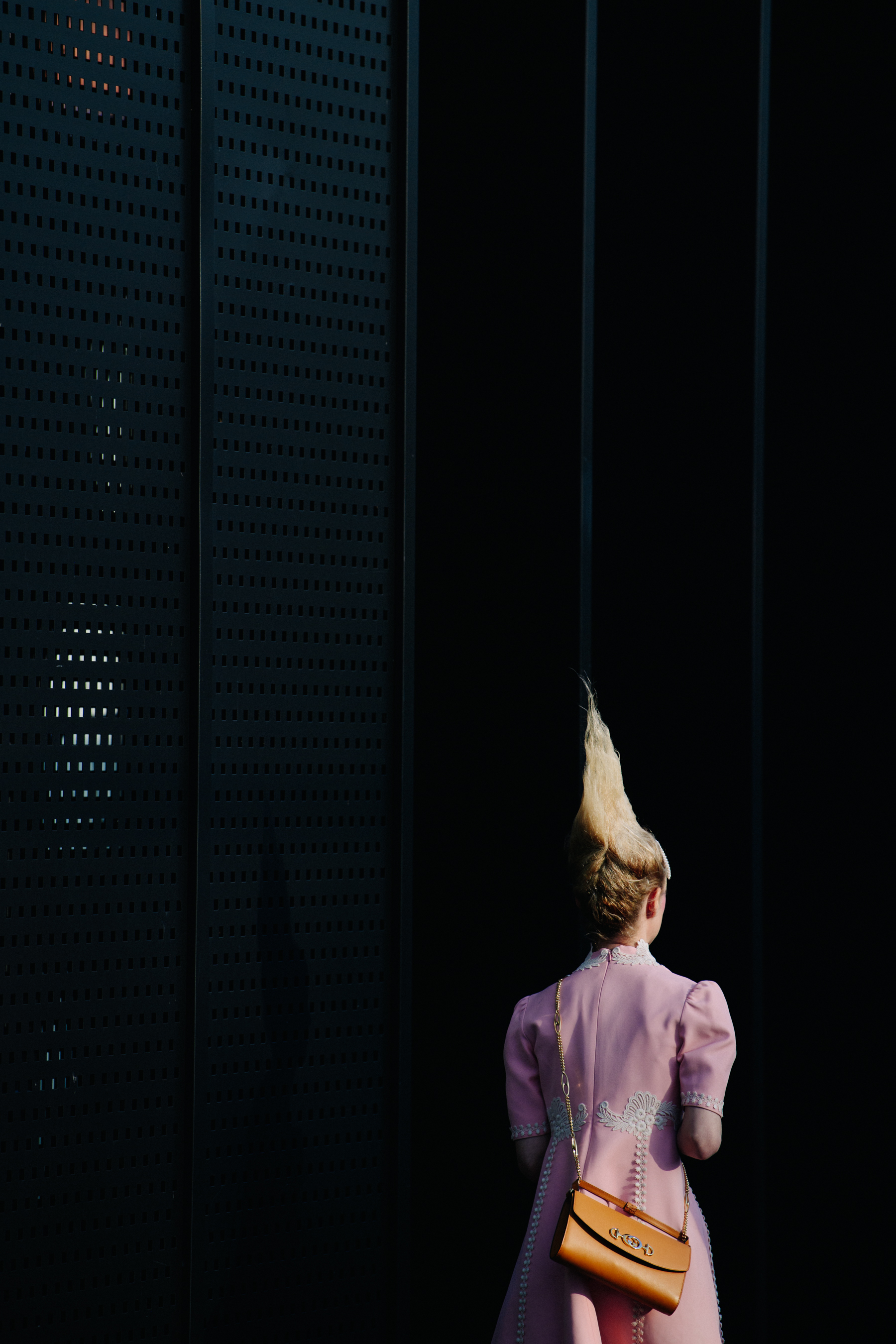 Woman wearing pink coat
