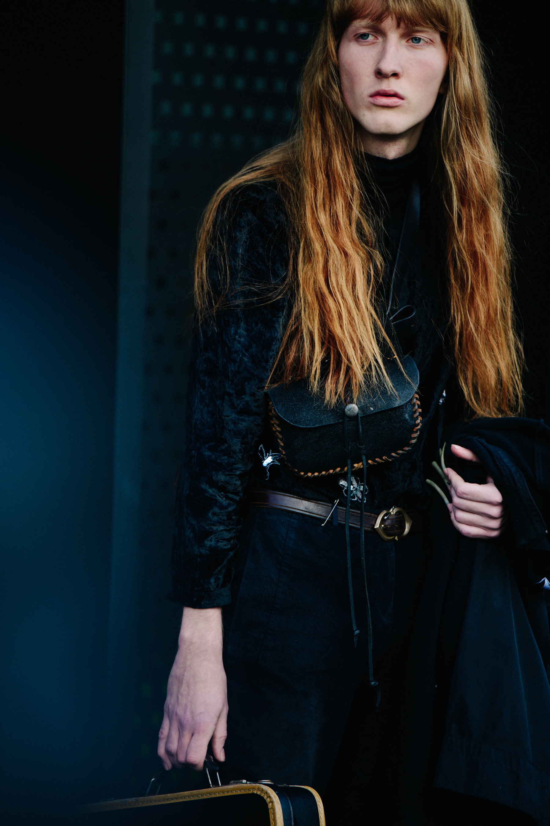 Model wearing black outfit