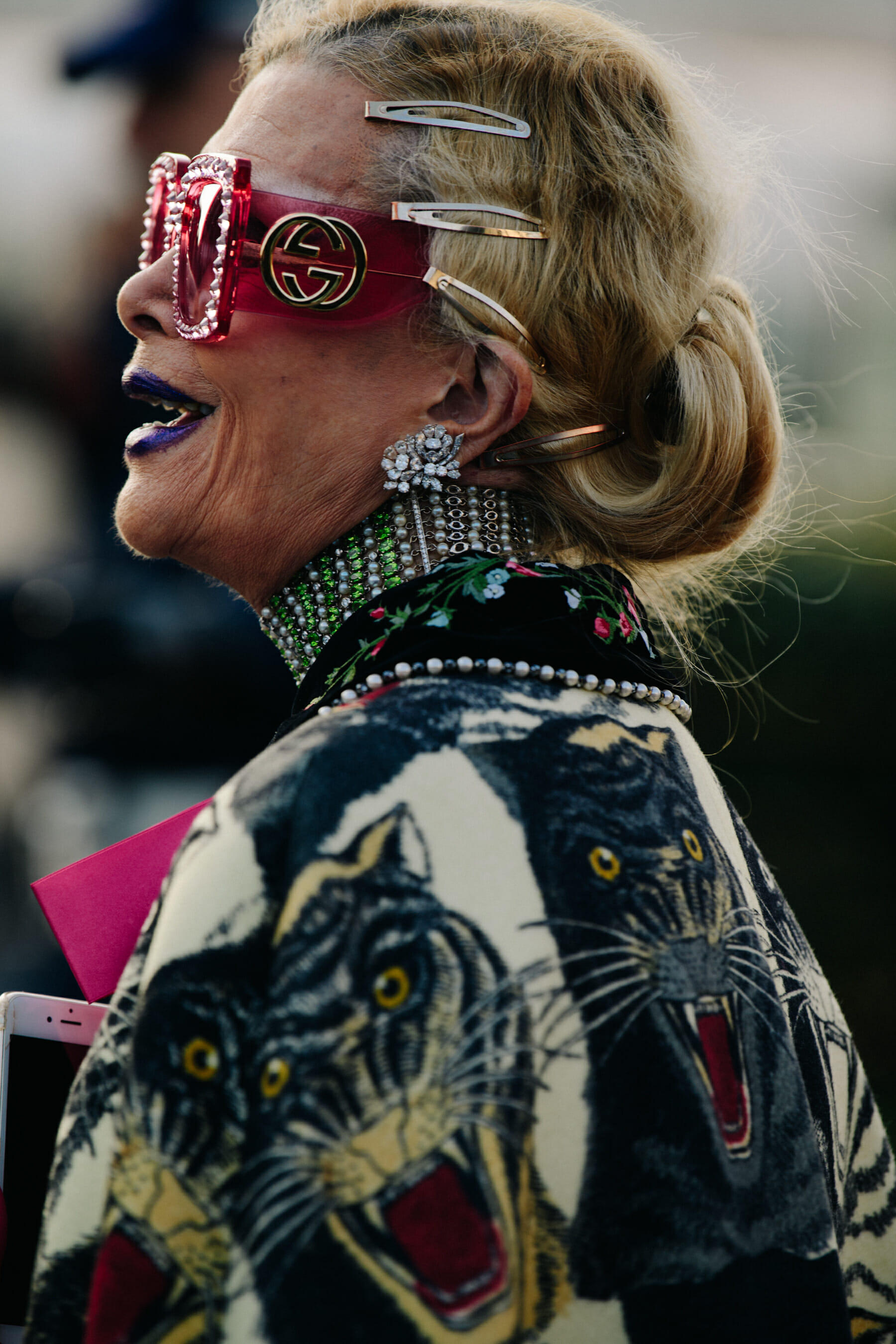 Woman wearing Gucci sunglasses