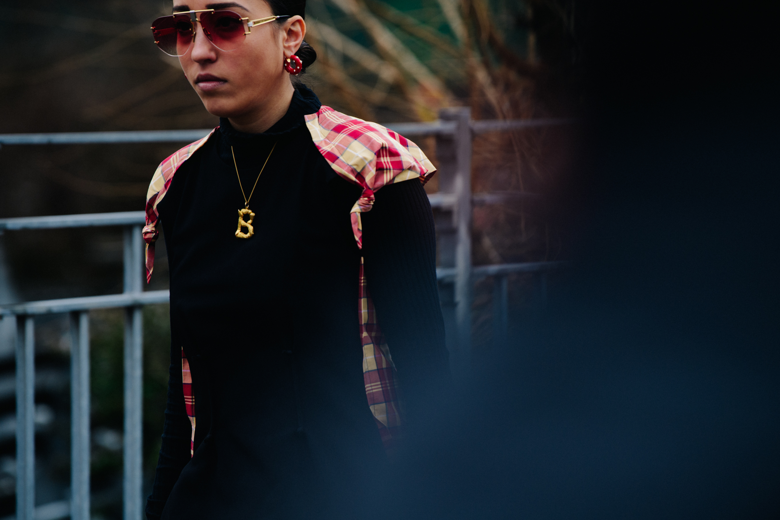 Woman wearing golden necklace