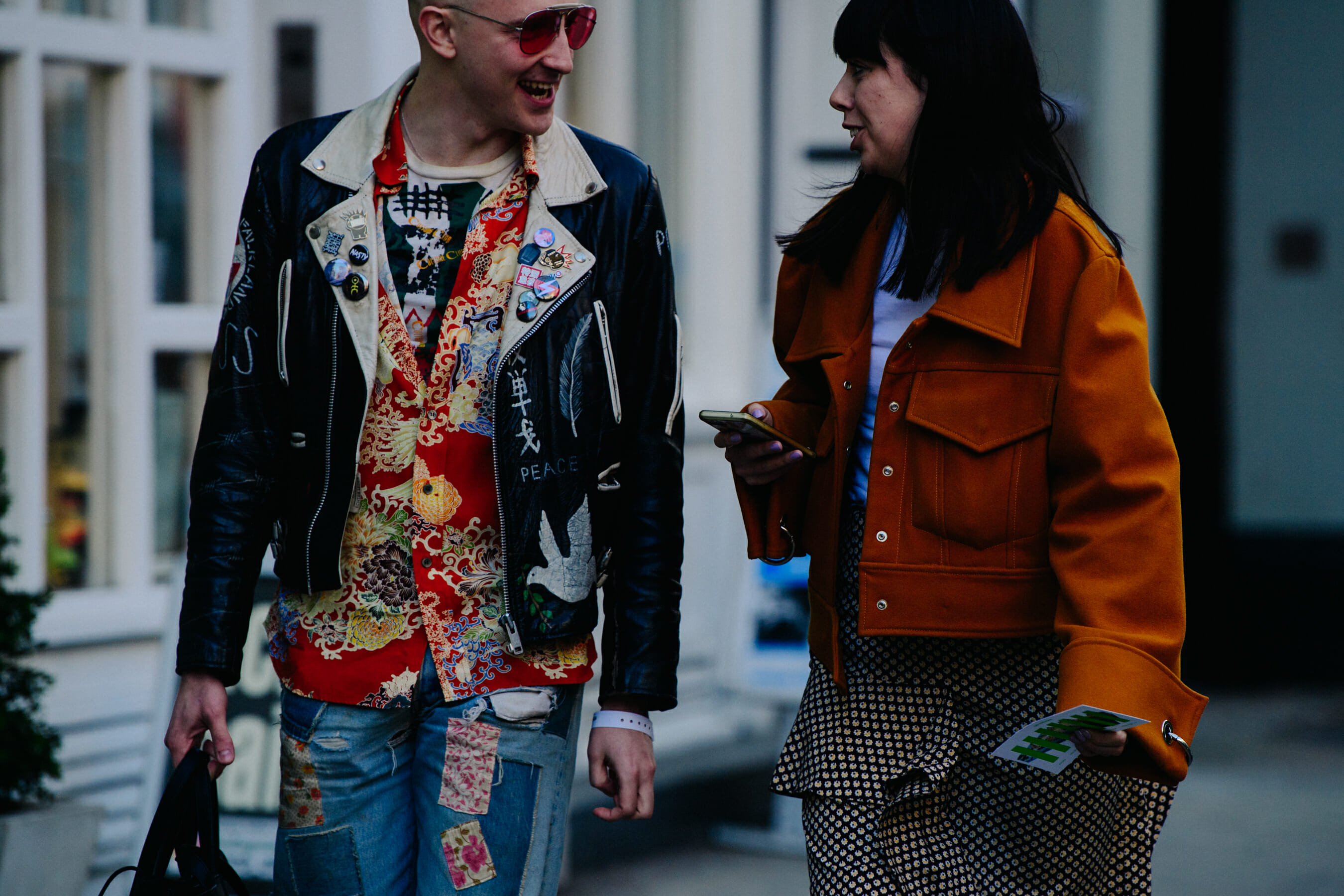 Couple wearing stylish jackets