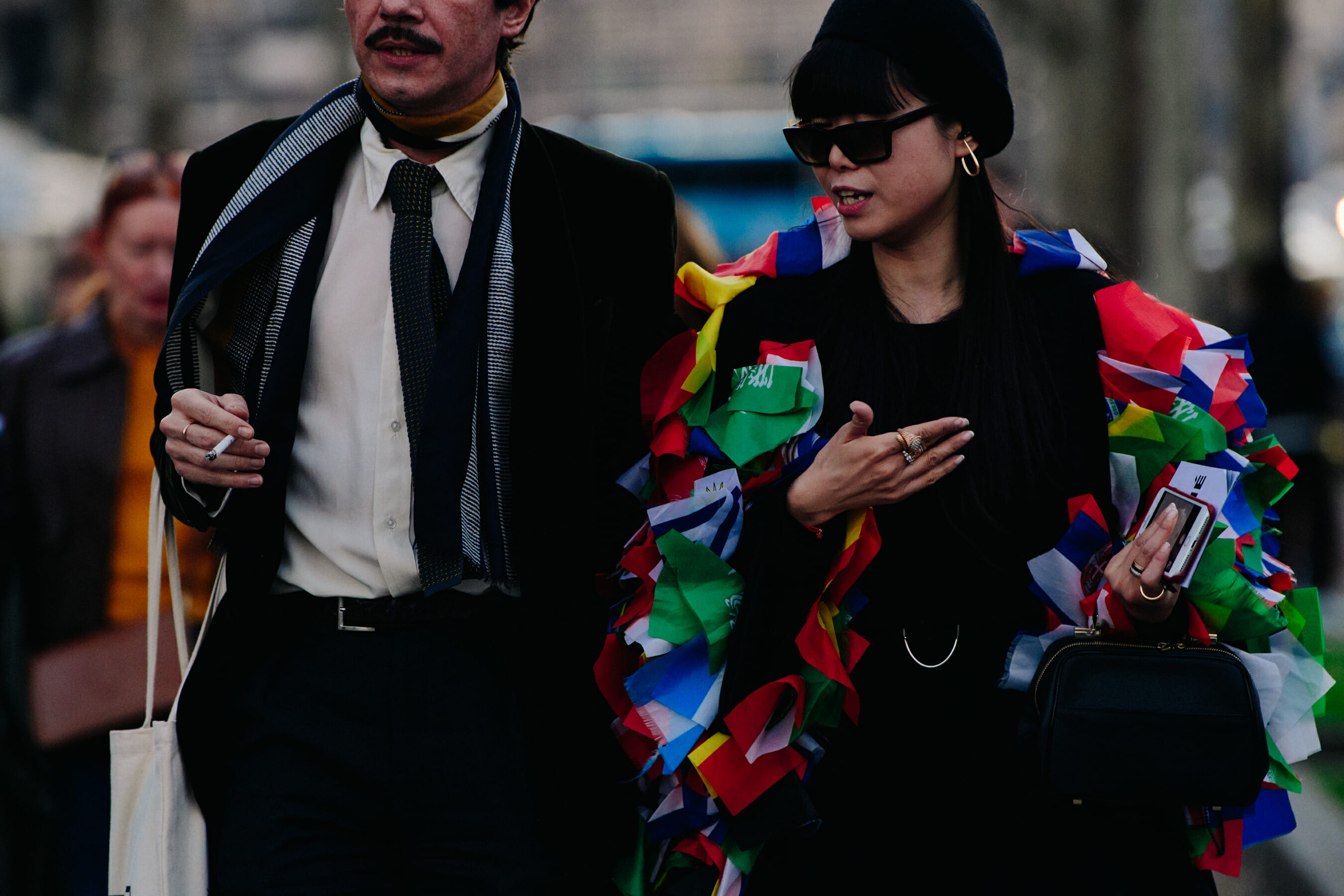 Couple wearing dark outfits