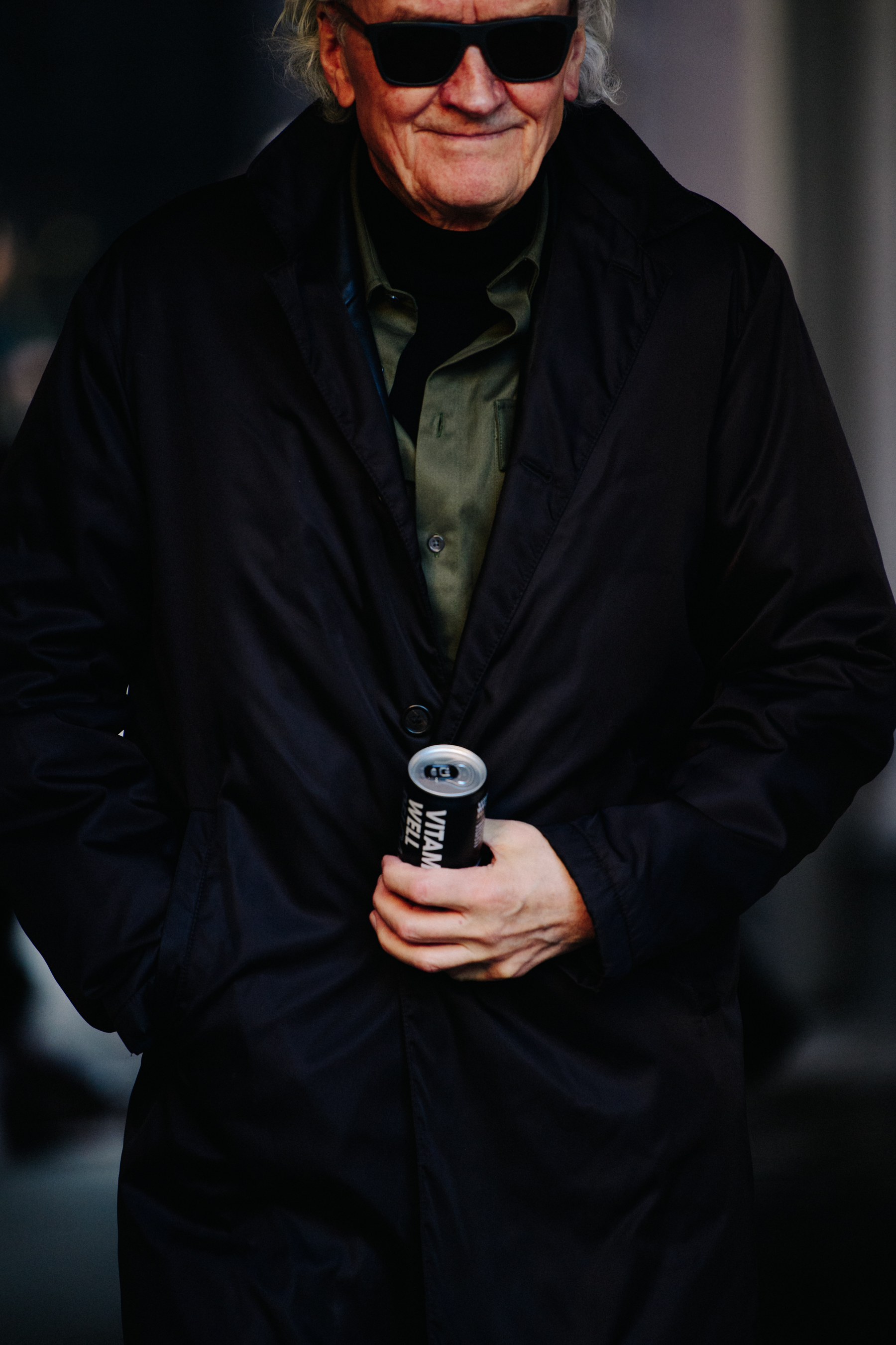 Man wearing black coat