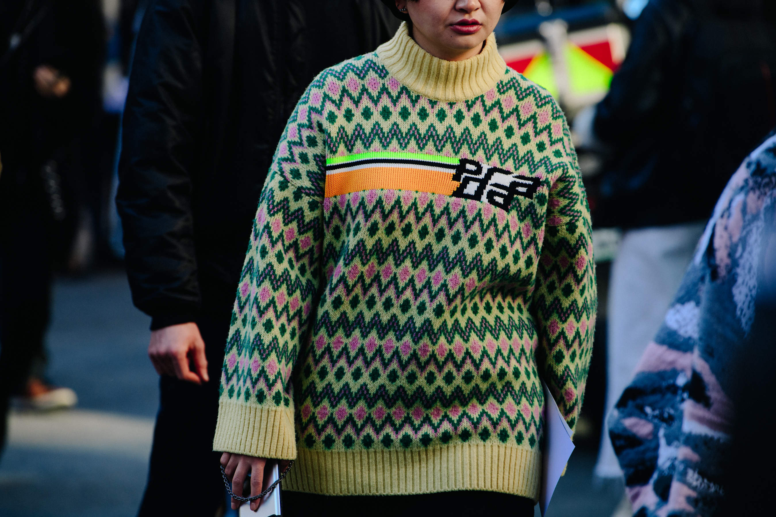 Woman wearing Prada jumper