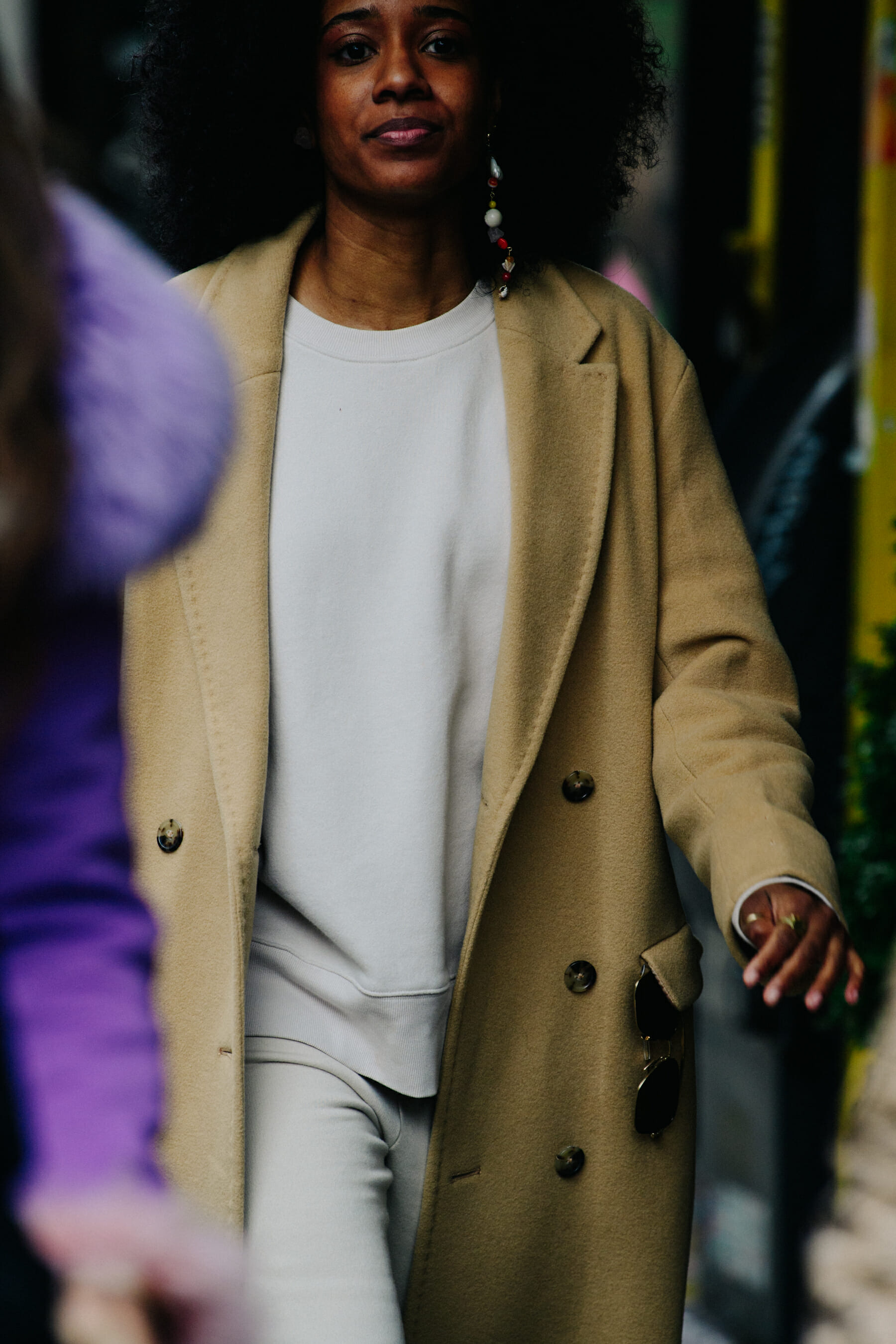 Woman wearing white jumper