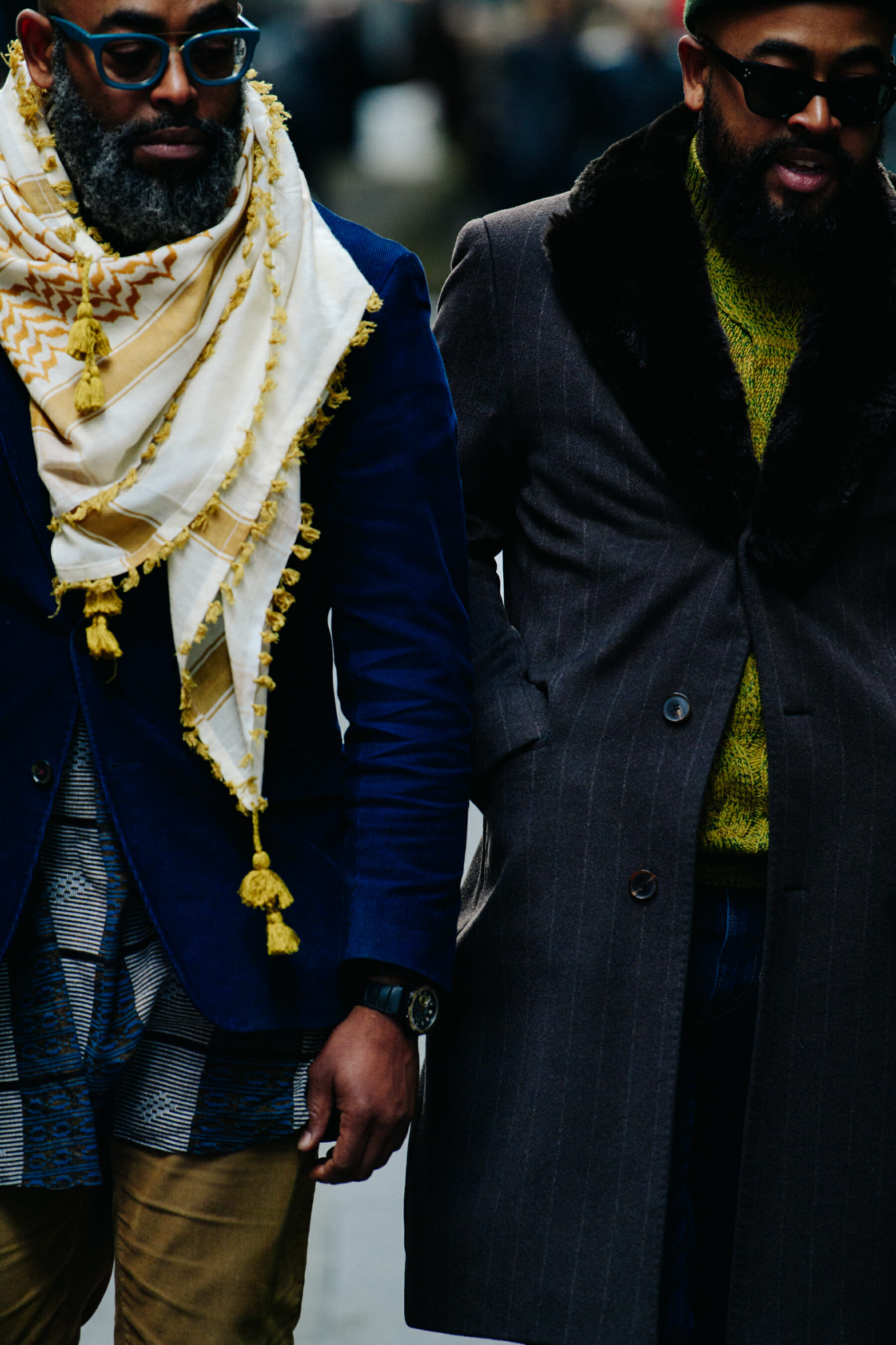 Two men wearing winter suits