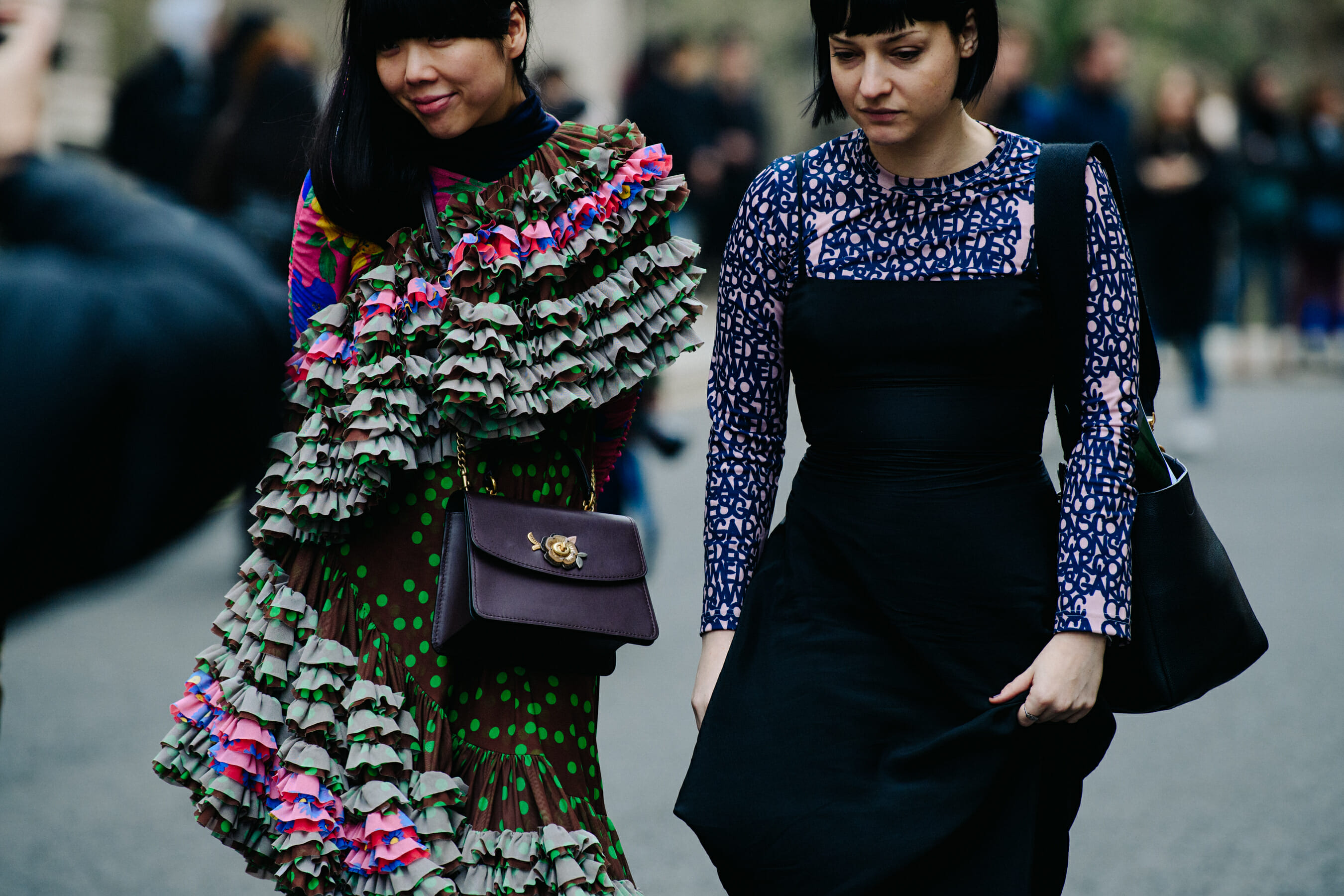 Two women wearing patterns