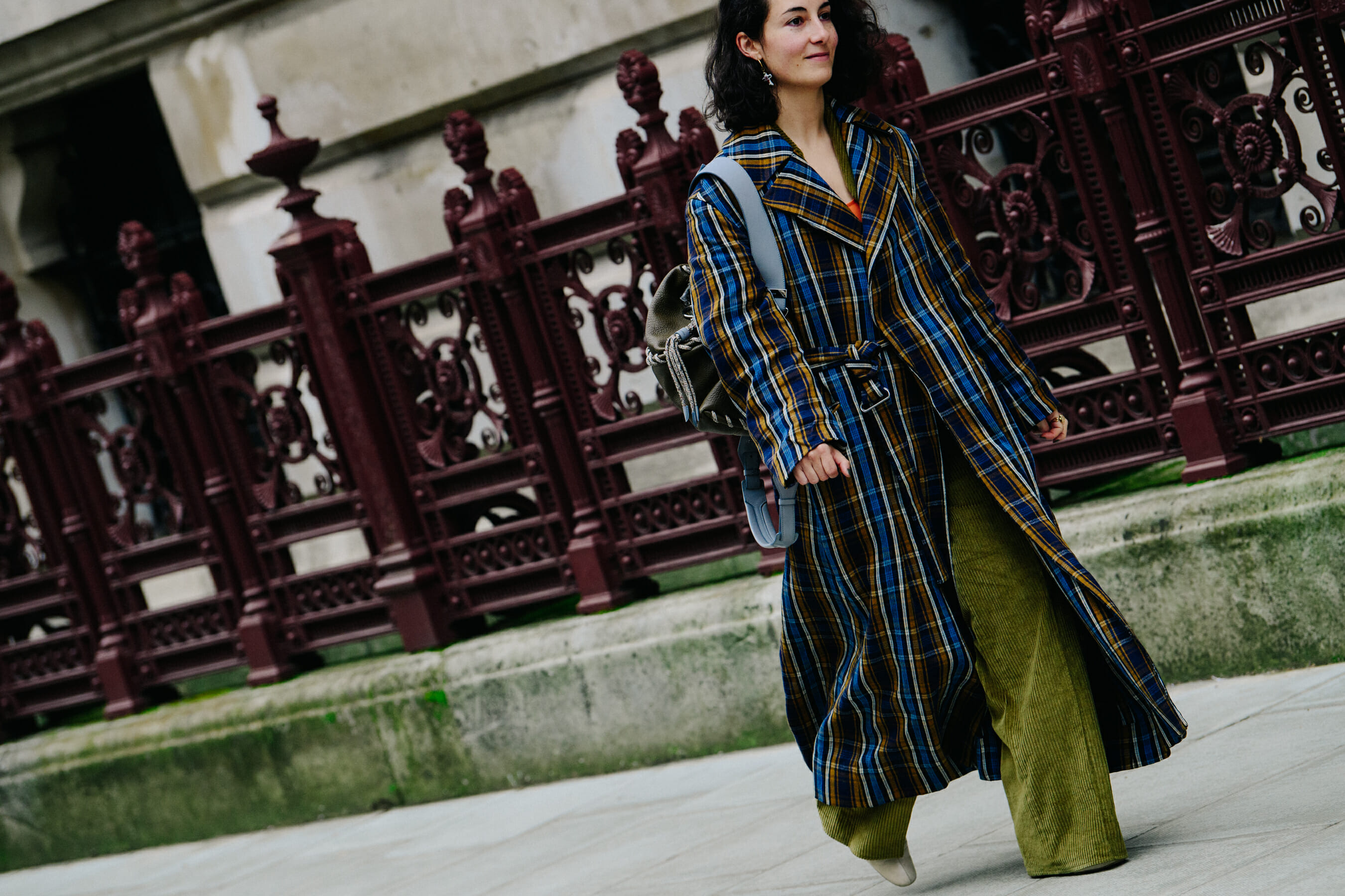 Woman wearing check coat