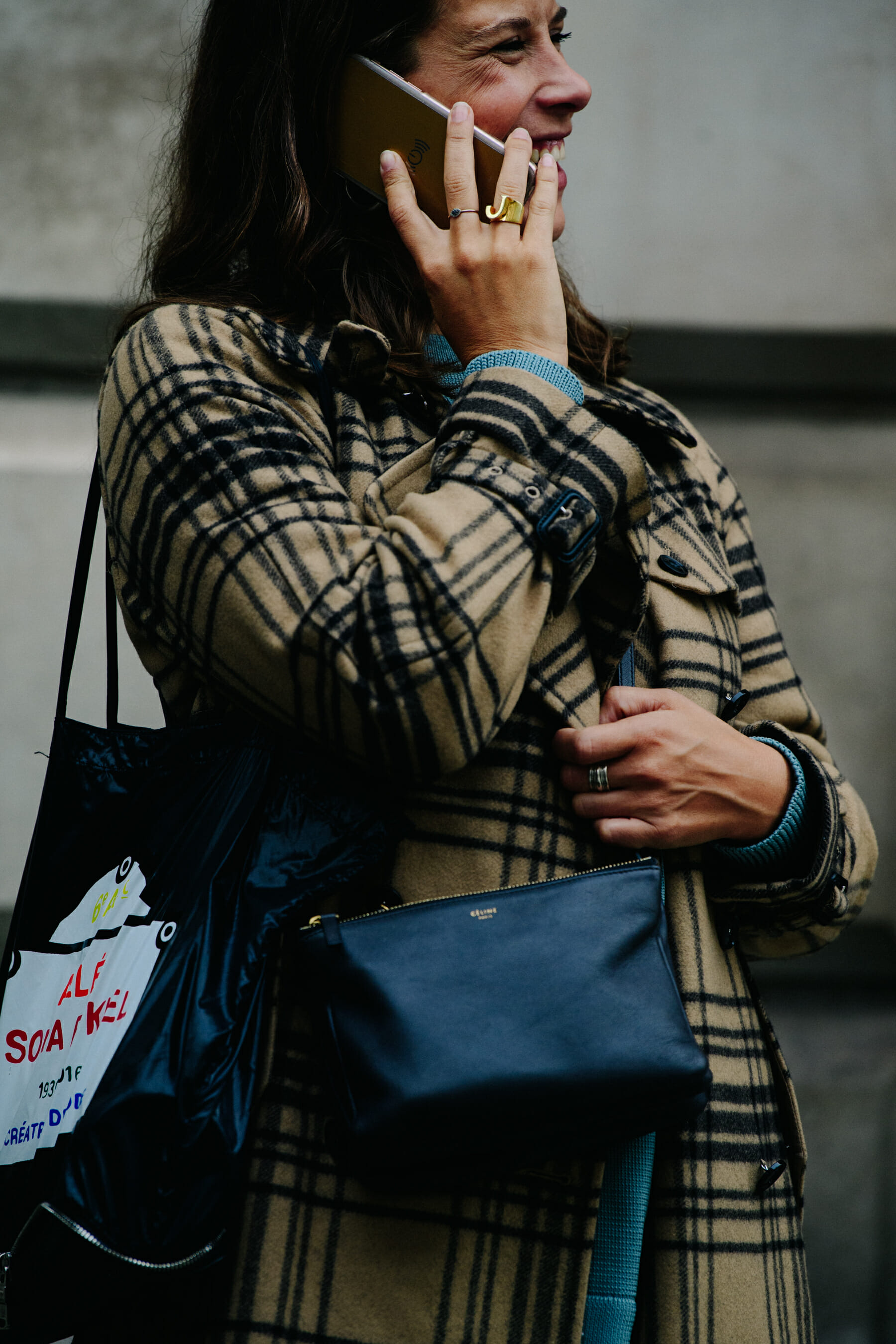 Woman wearing brown check coat