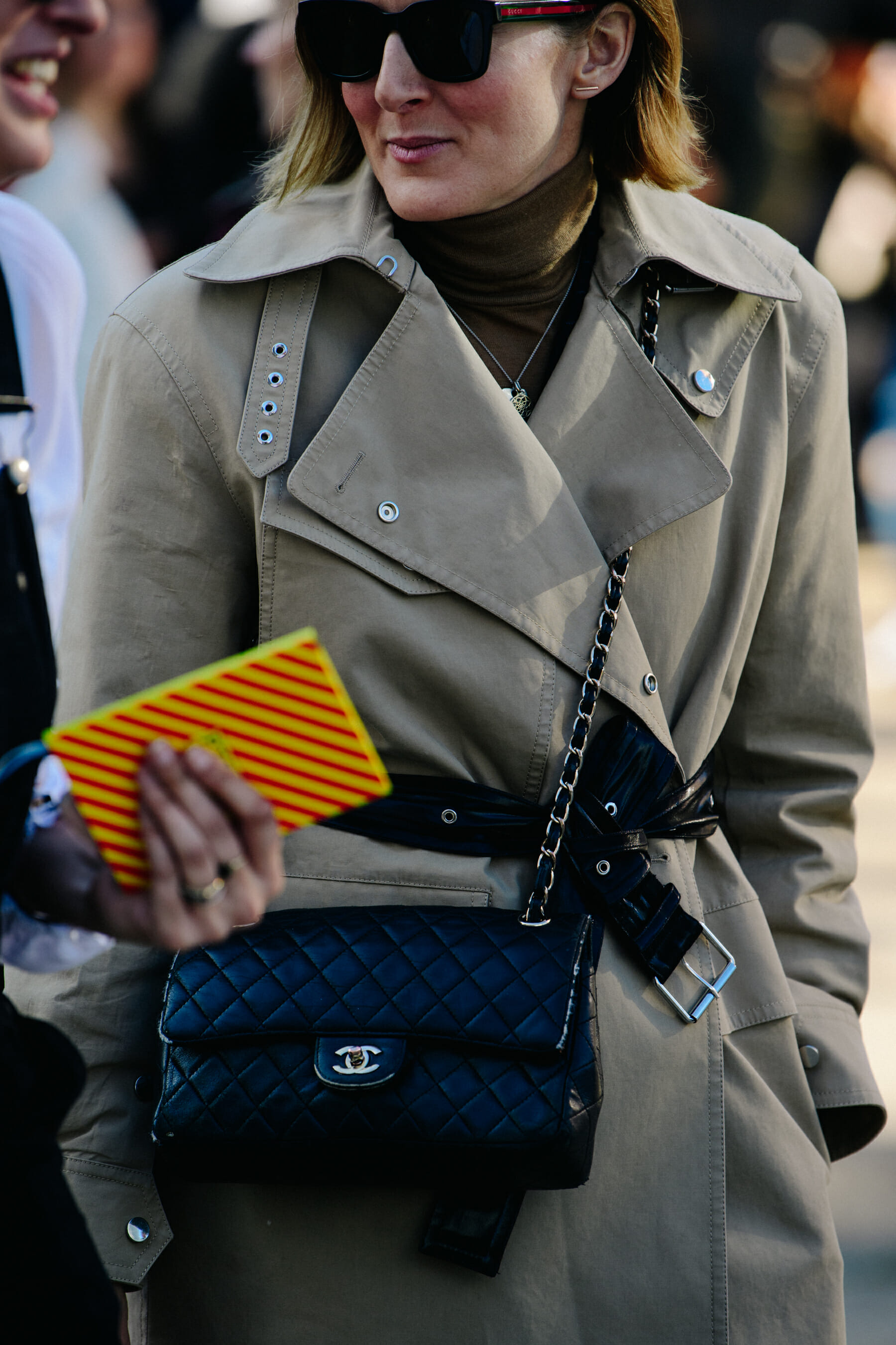 Woman carrying Chanel bag
