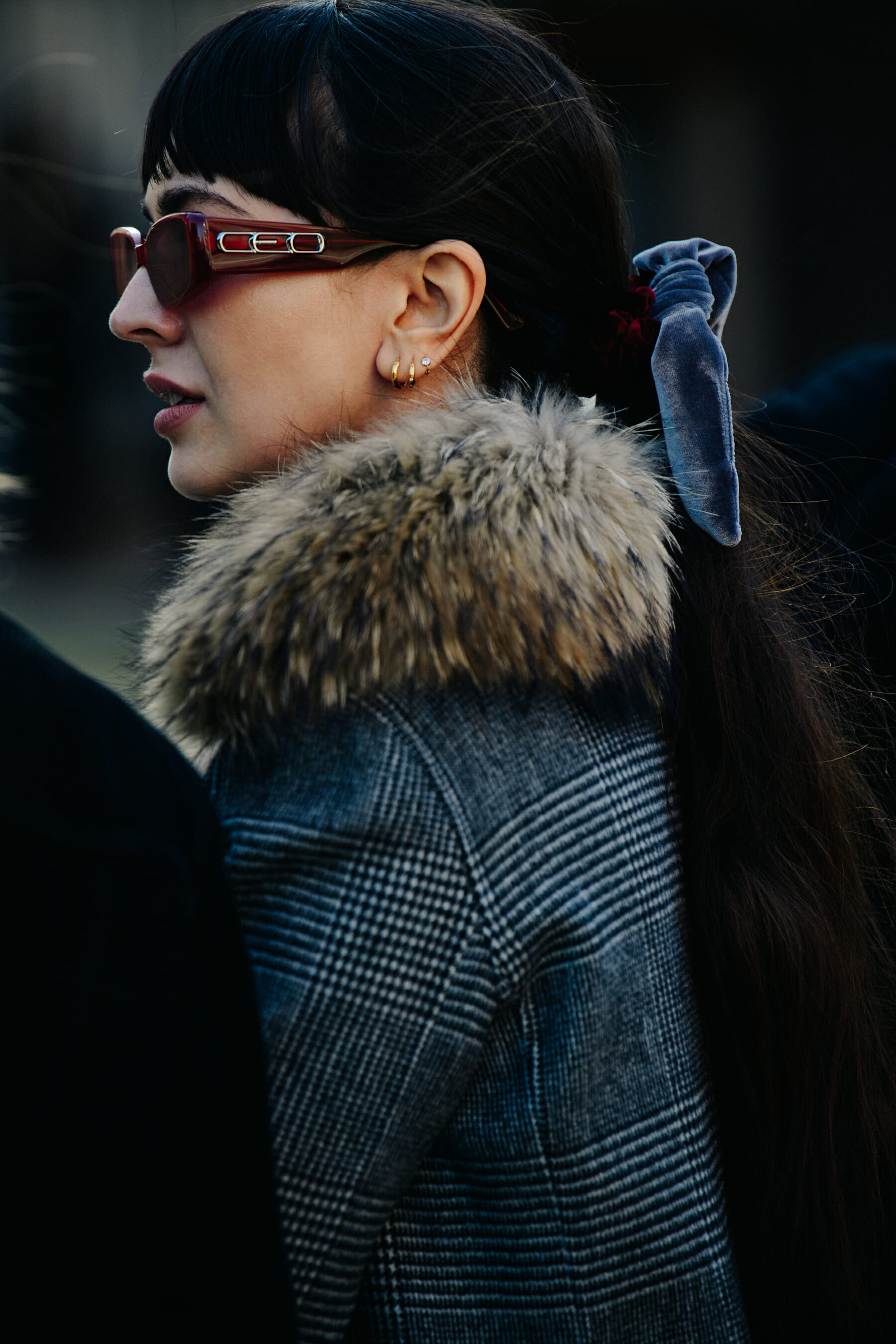 Woman wearing brown glasses
