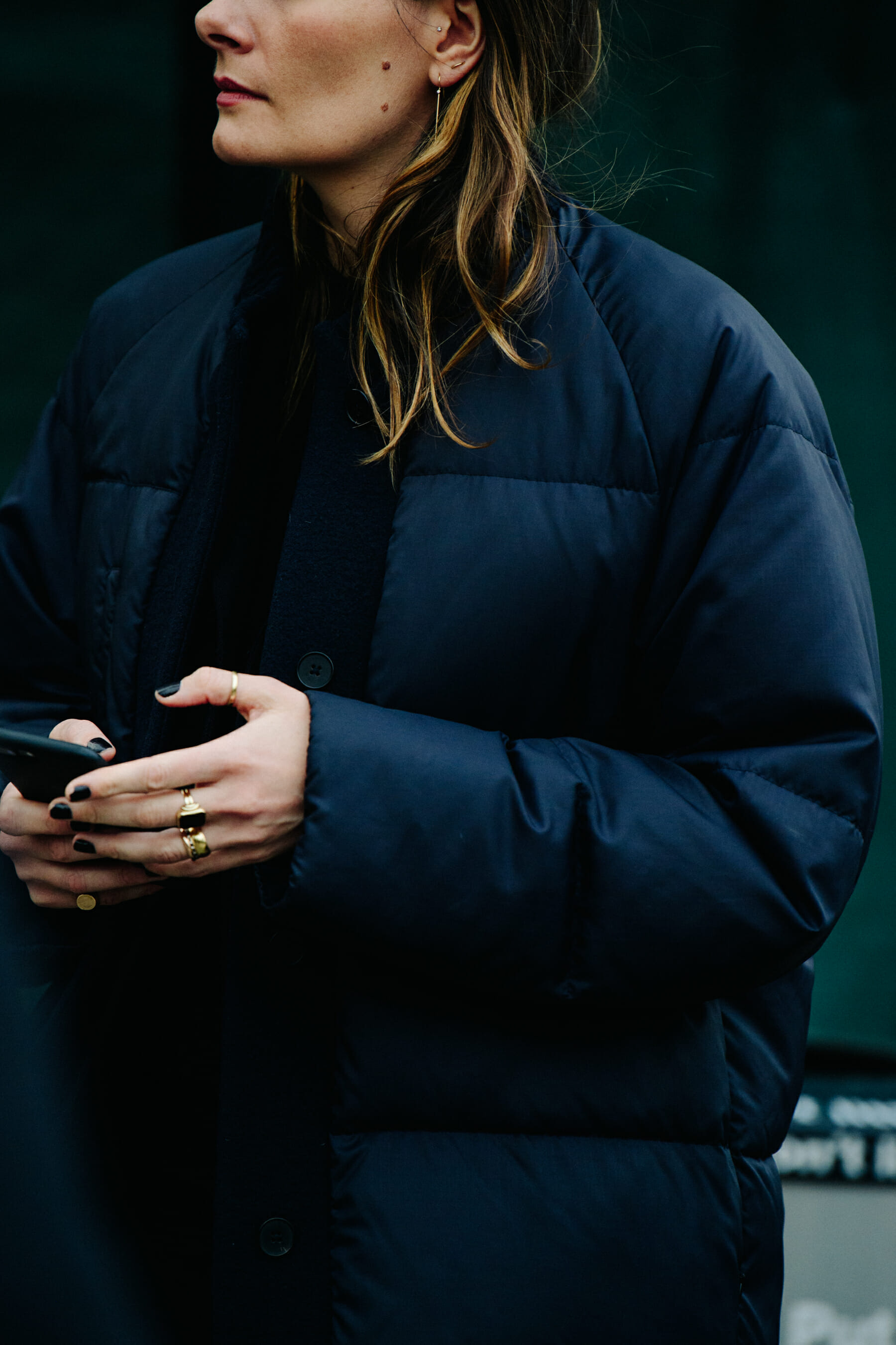 Woman wearing black puffer jacket