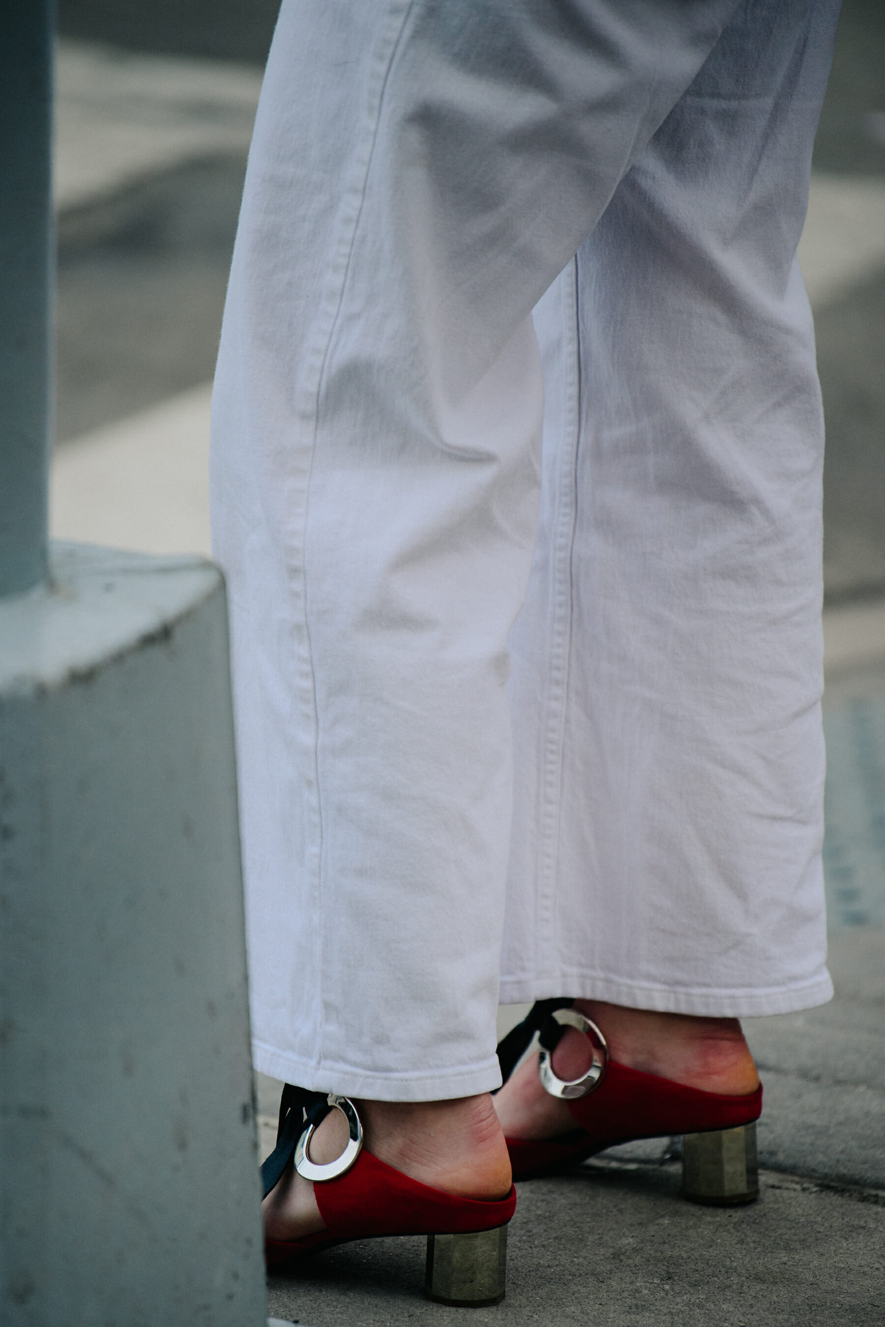 Woman wearing white jeans